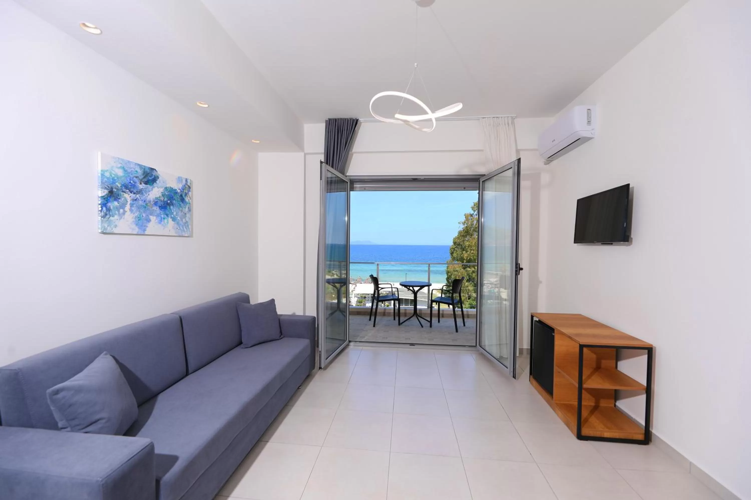 Communal lounge/ TV room in Maor Hotel