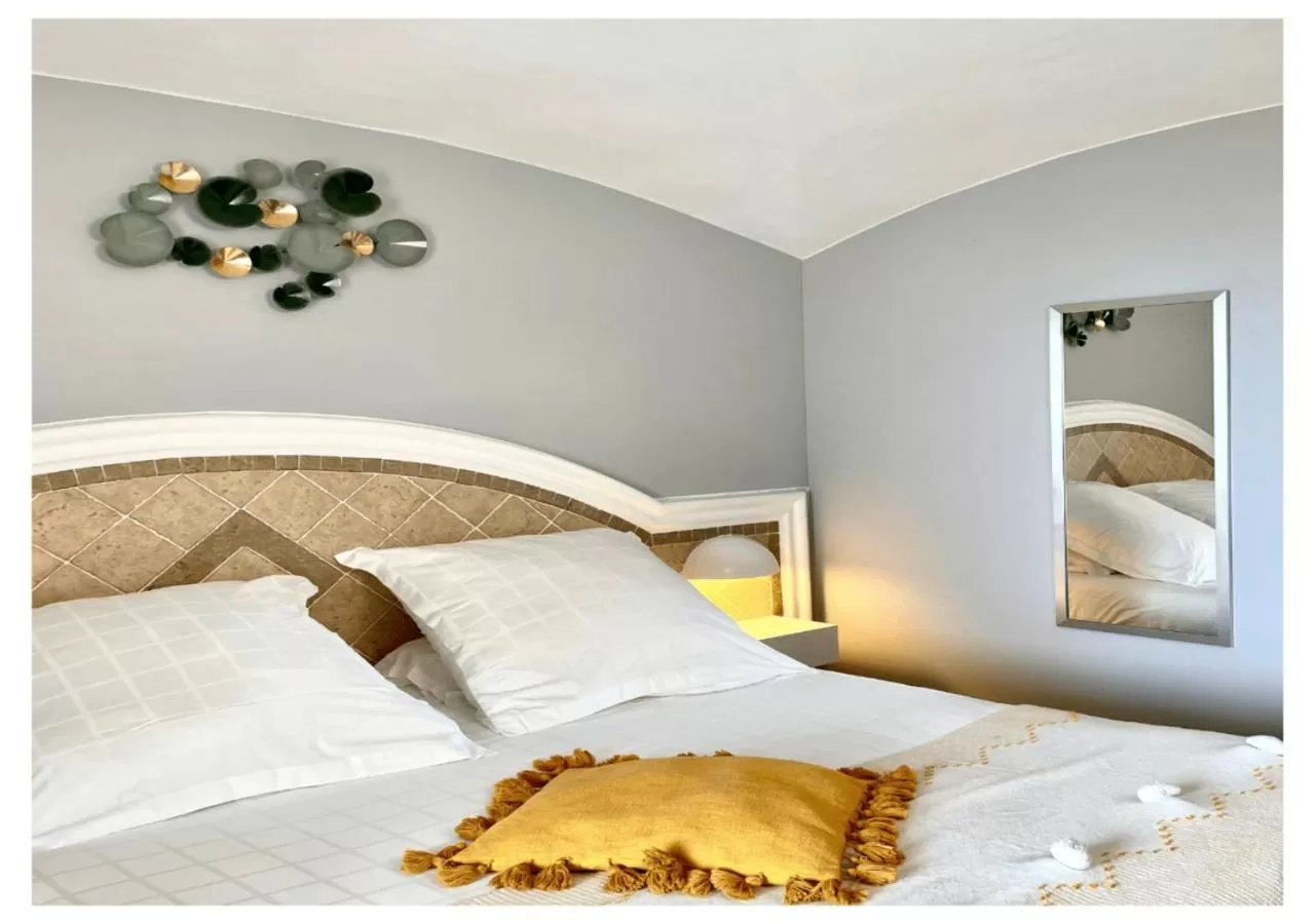 Bed in Ostella Spa & Resort