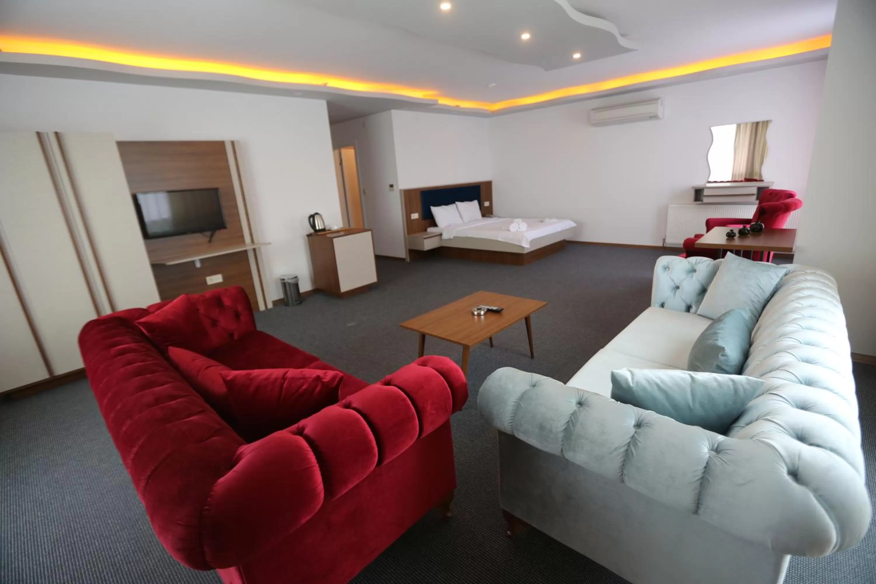 Bed in TEVETOGLU HOTEL