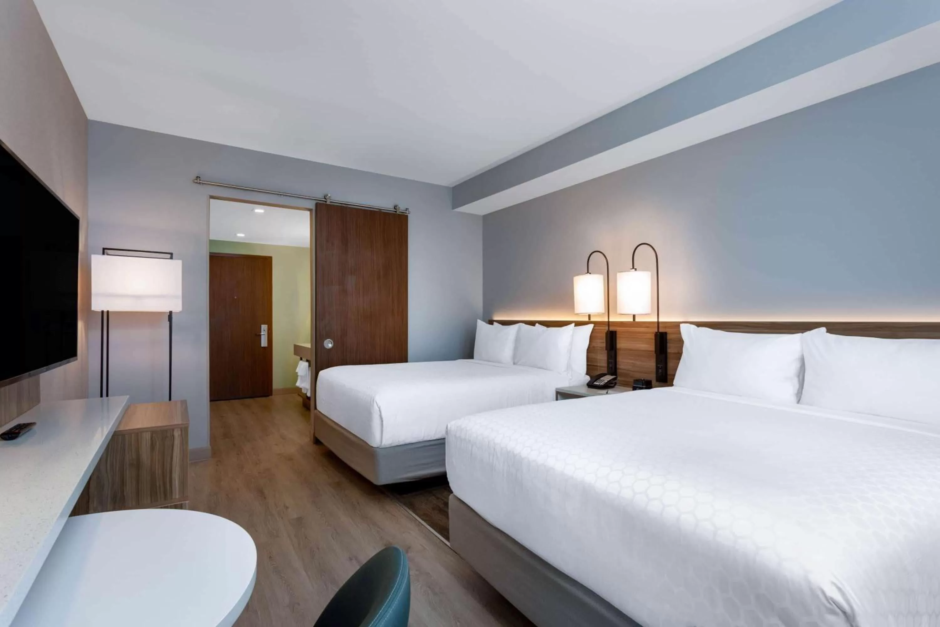 Photo of the whole room, Bed in Wyndham Garden Miami International Airport