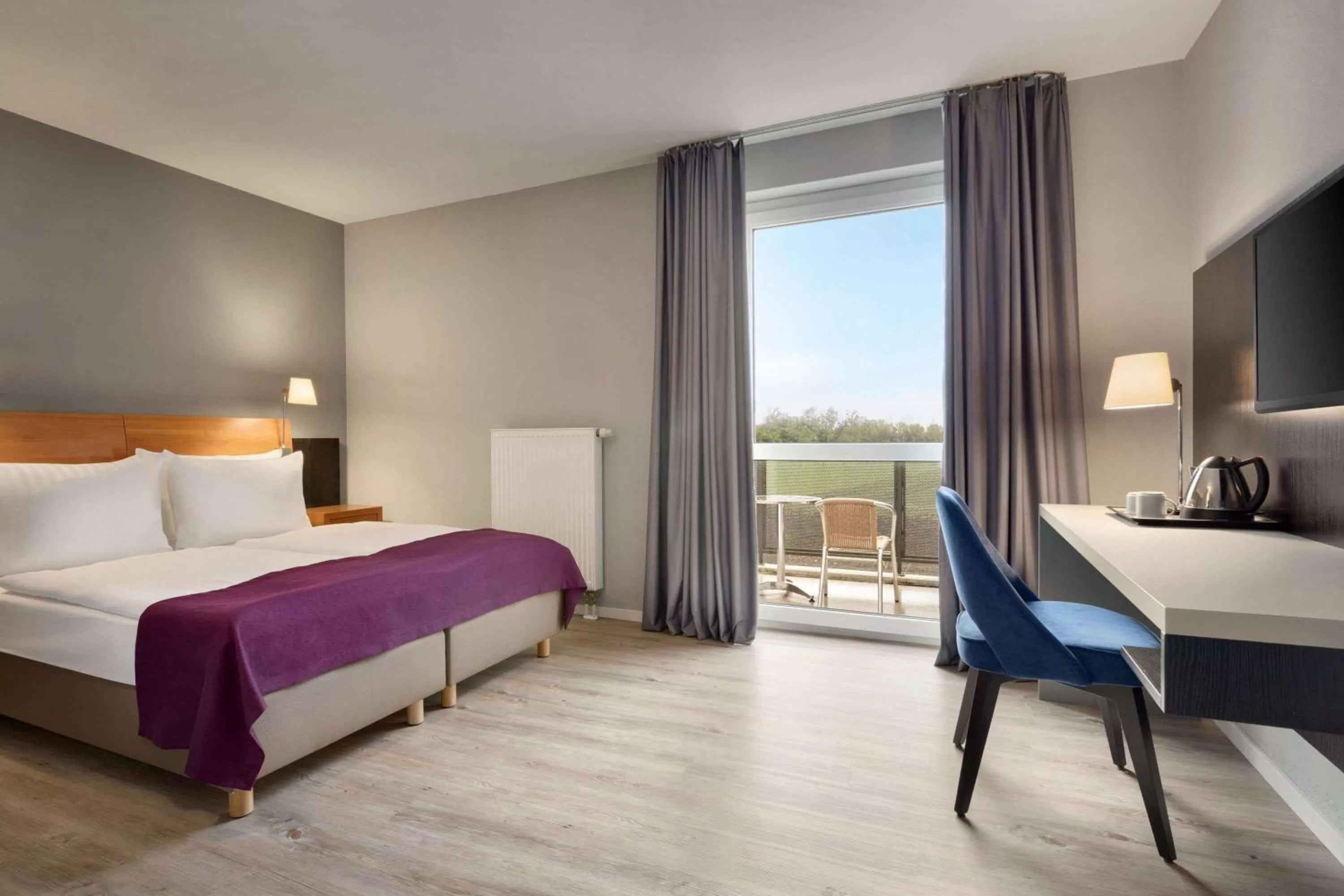 Photo of the whole room, Bed in Ramada by Wyndham München Airport