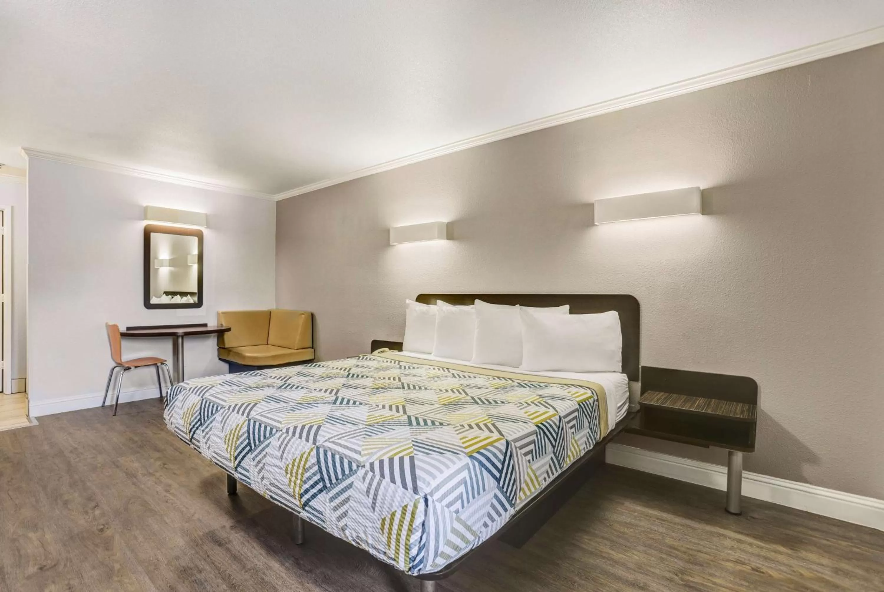 Seating area, Bed in Motel 6-Lodi, CA