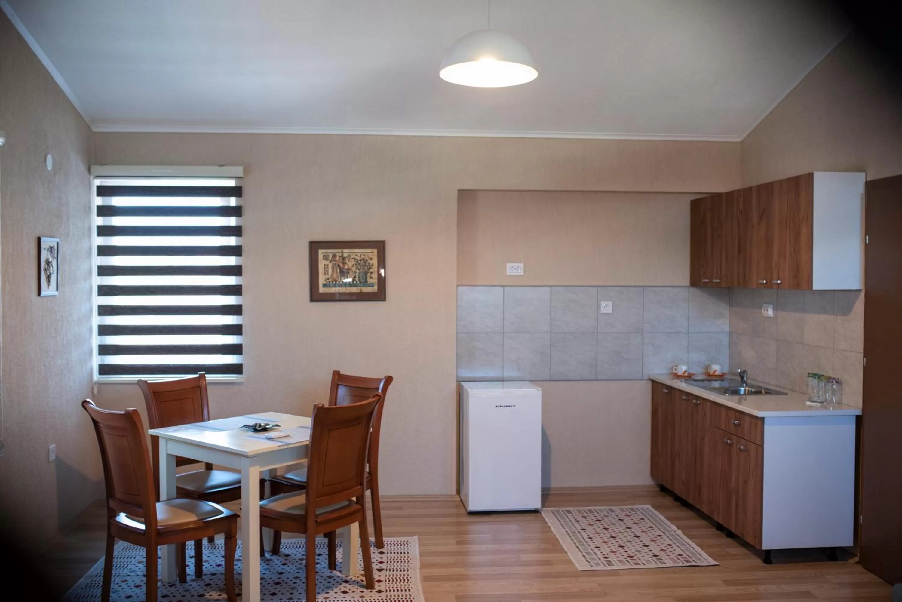 Kitchen/Kitchenette in DIONIS Rooms & Apartments