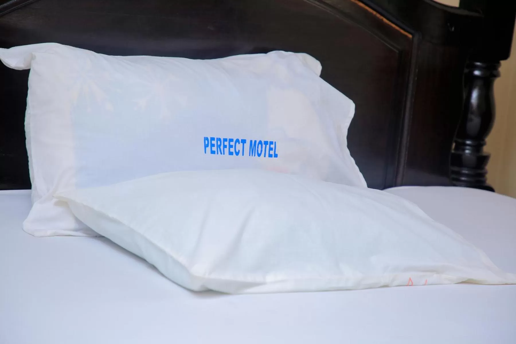 Bed in Perfect Motel