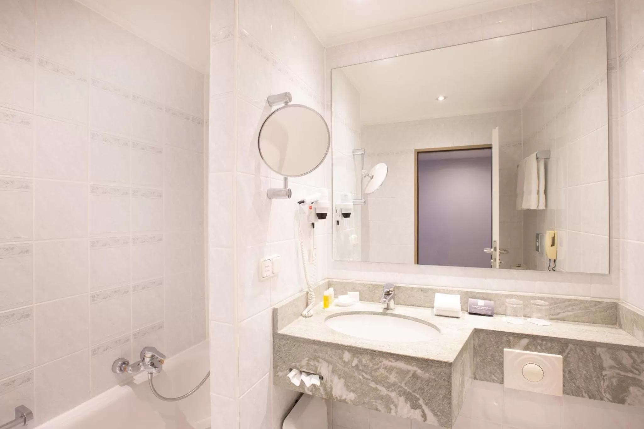 Bathroom in Crowne Plaza Frankfurt Congress Hotel by IHG