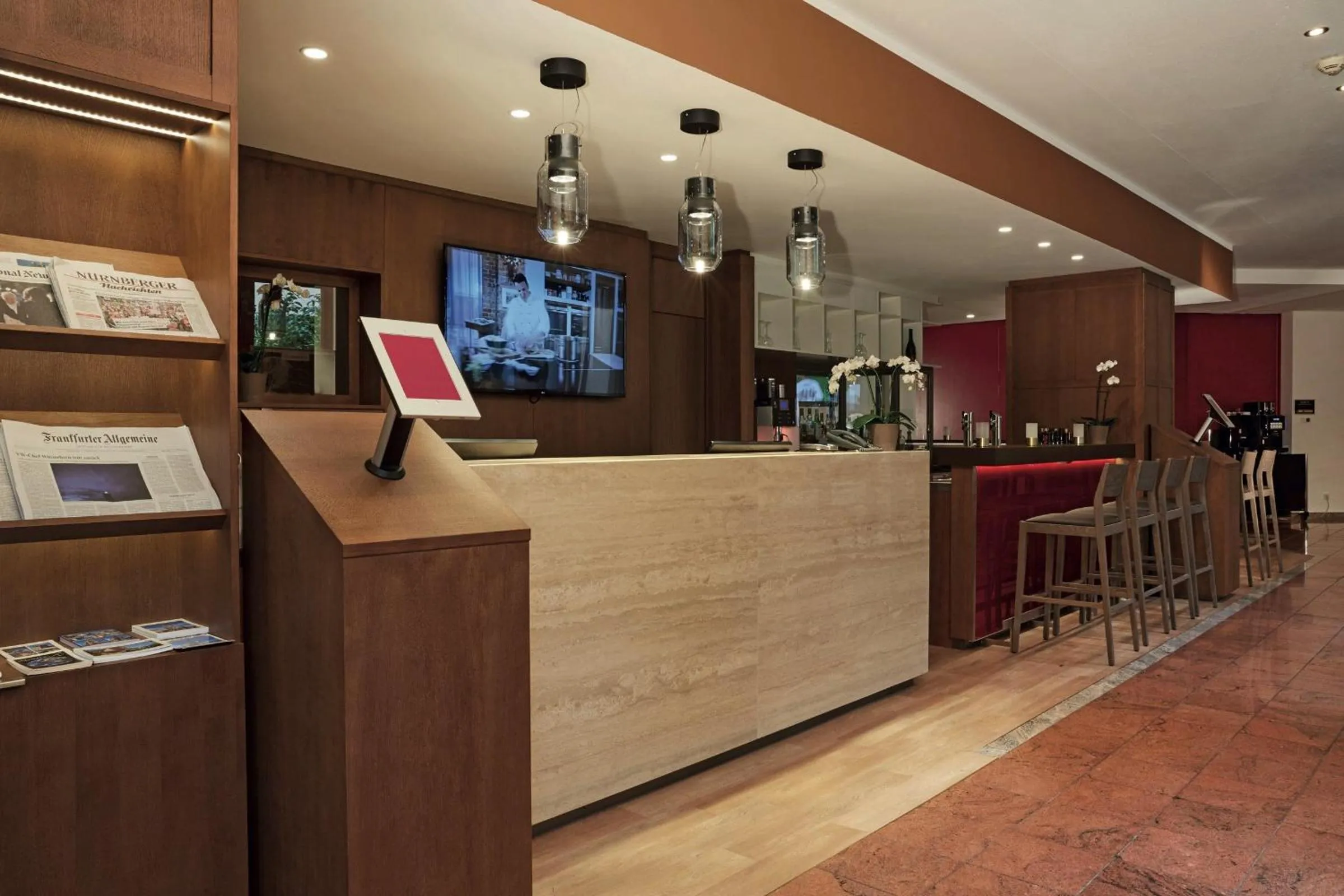 Lobby or reception in H+ Hotel Nürnberg