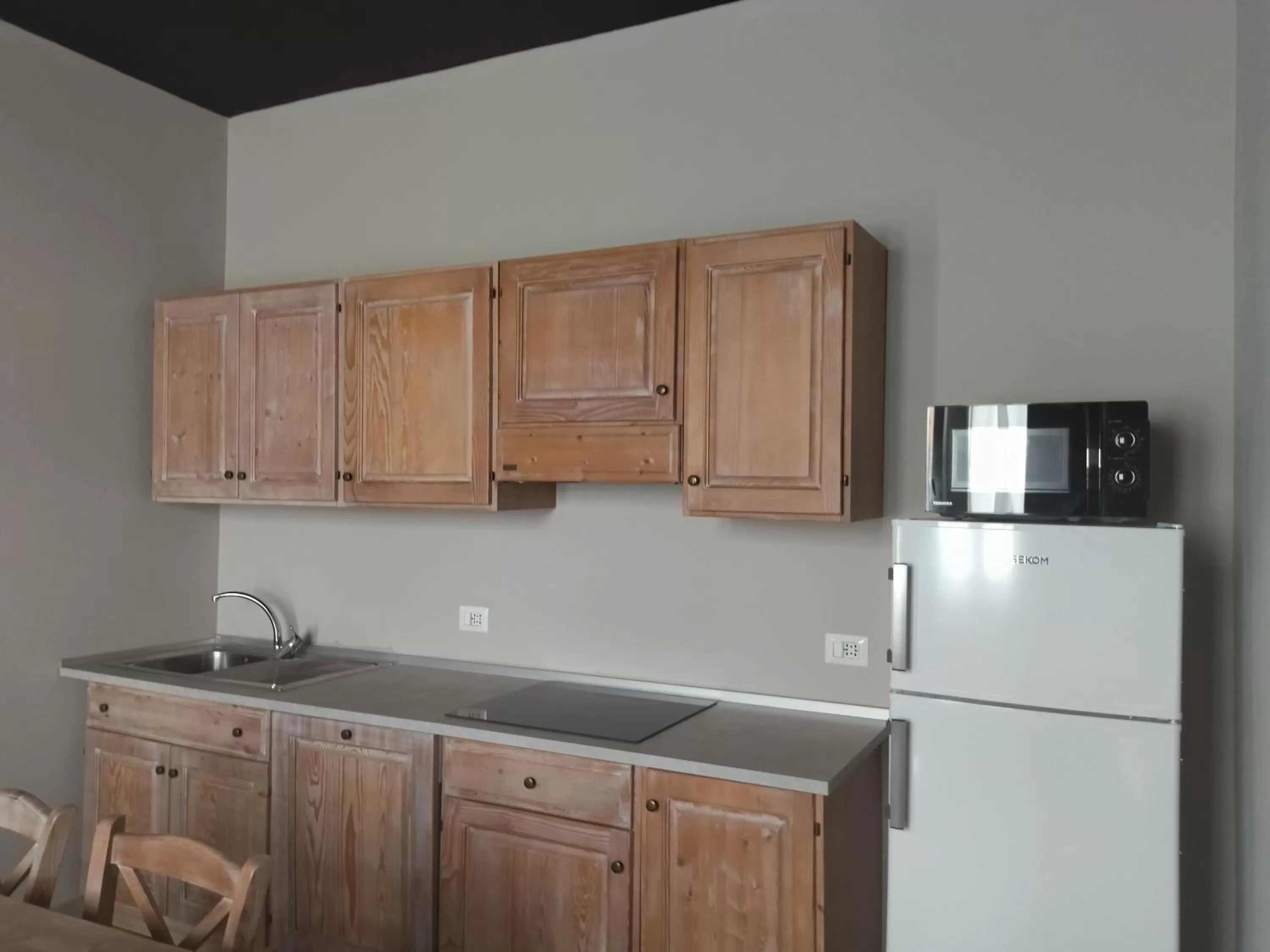 Kitchen or kitchenette in Le Coltie - affittacamere e appartamenti