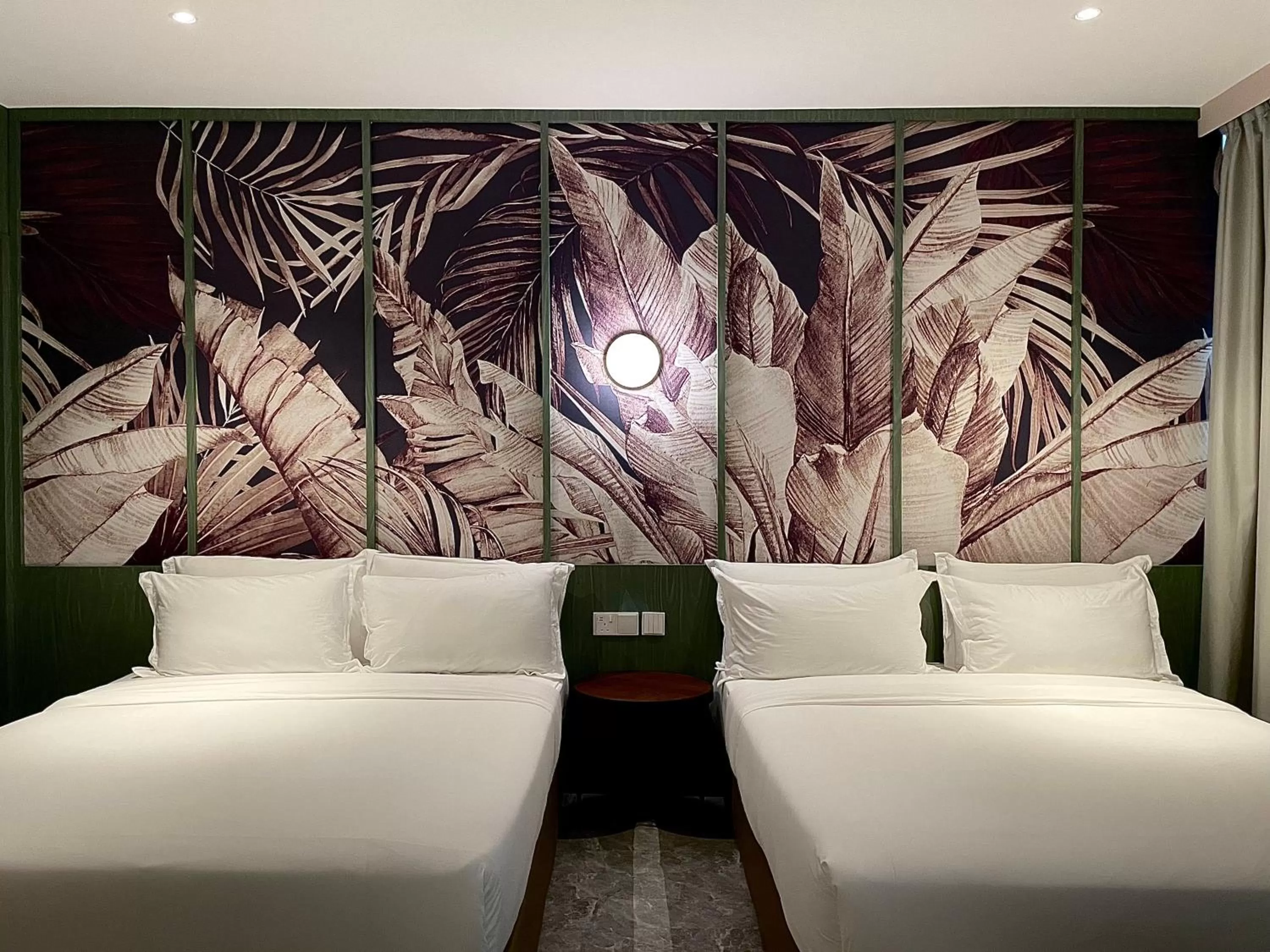 Bed in Harper Boutique Hotel at Sutera Avenue