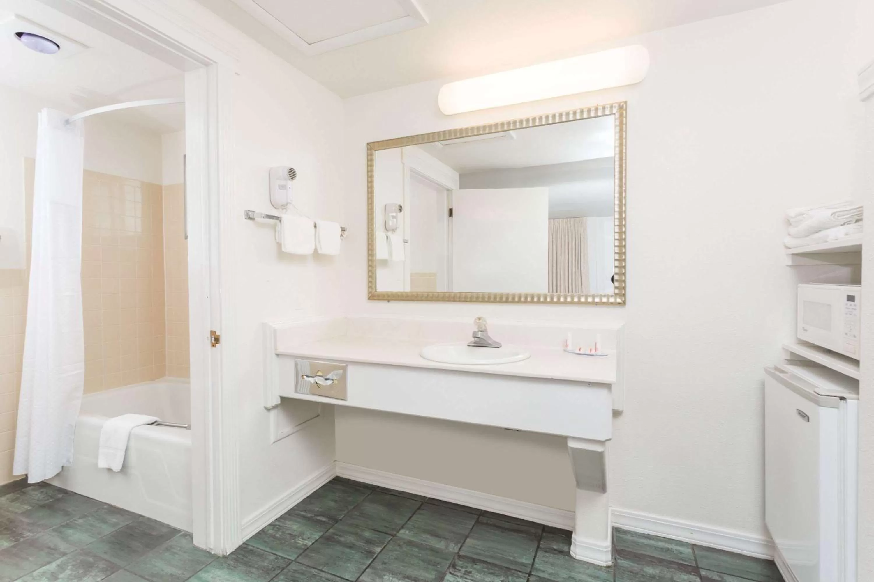 Bathroom in Days Inn by Wyndham Kimball