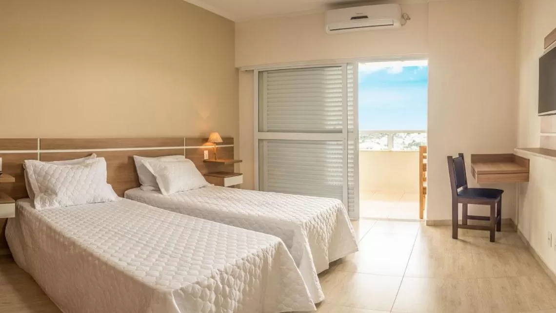 Bed in Pousada Serra Nascente do Sol