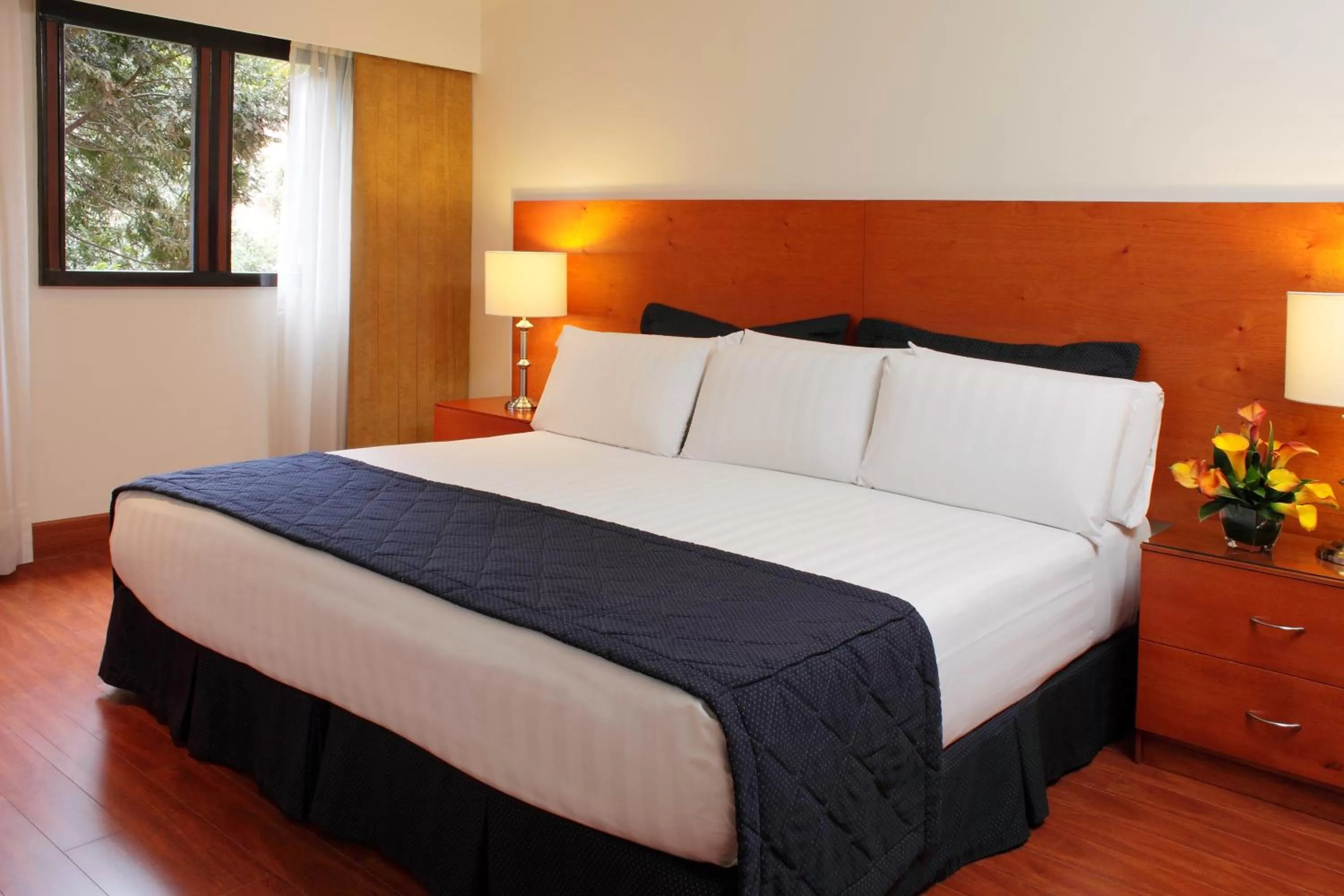 Bedroom, Bed in Estelar Apartamentos Bogotá - La Fontana