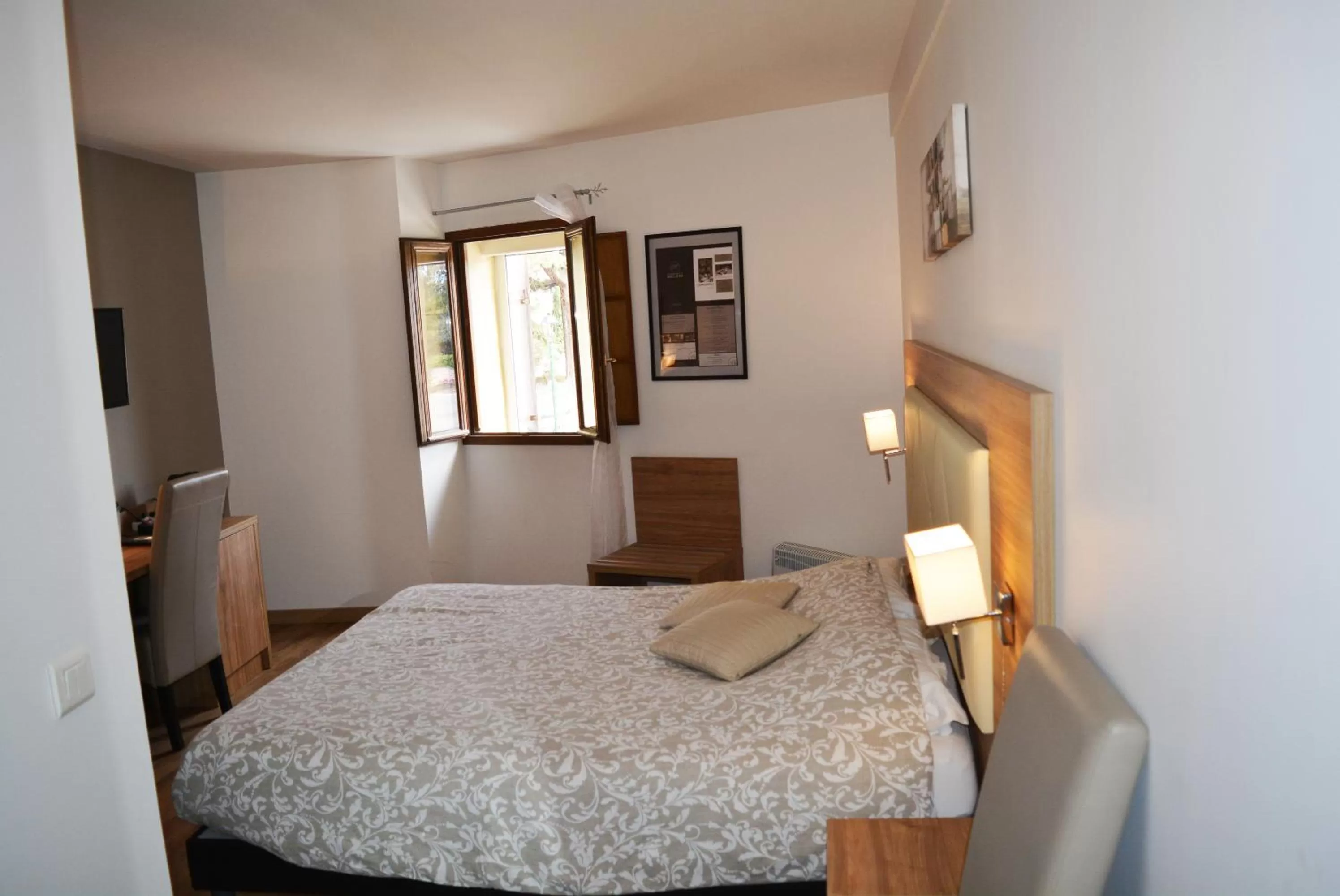 Bed in Le Grand Hôtel Molière