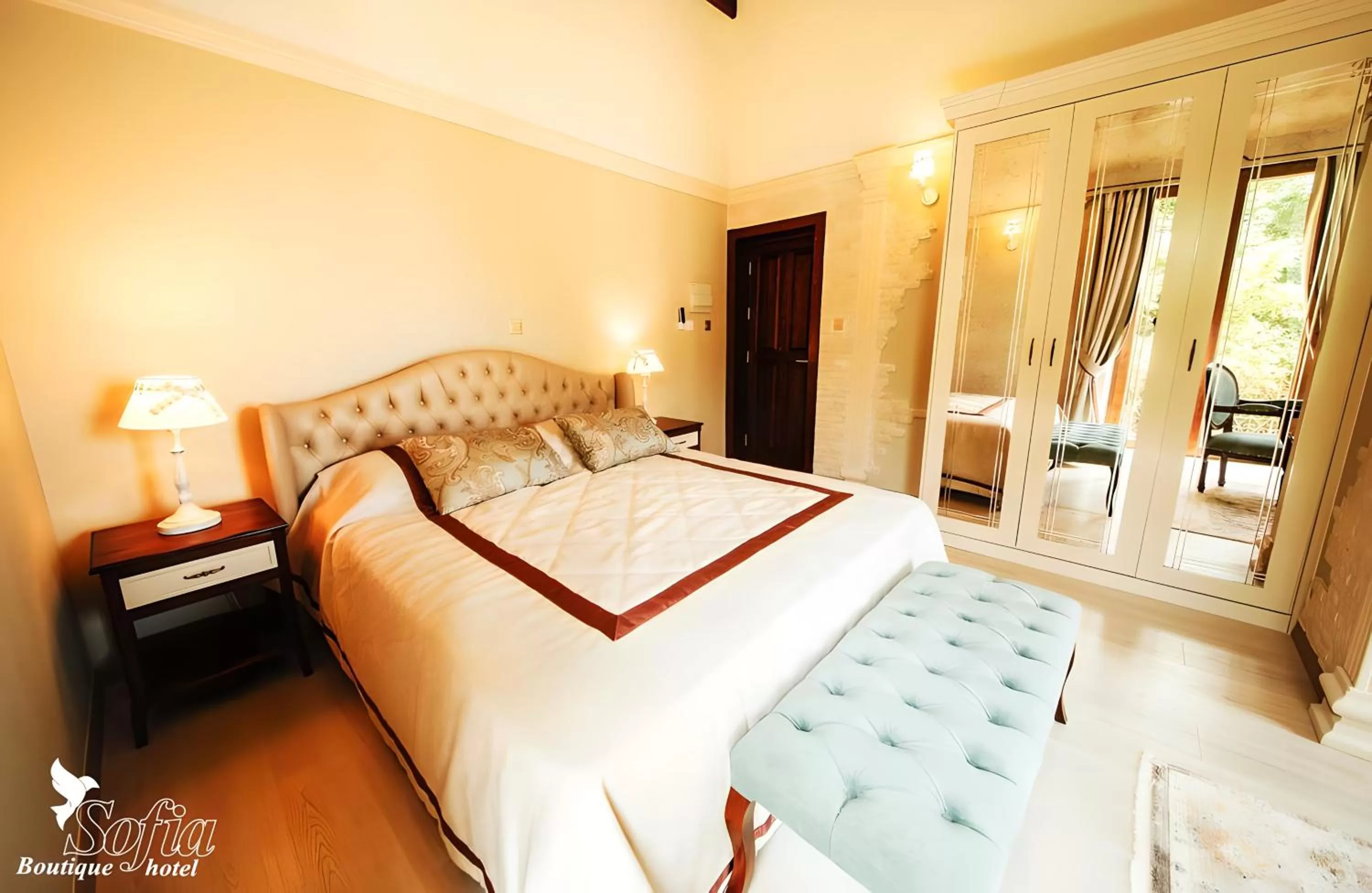 Bed in SOFIA BOUTIQUE HOTEL