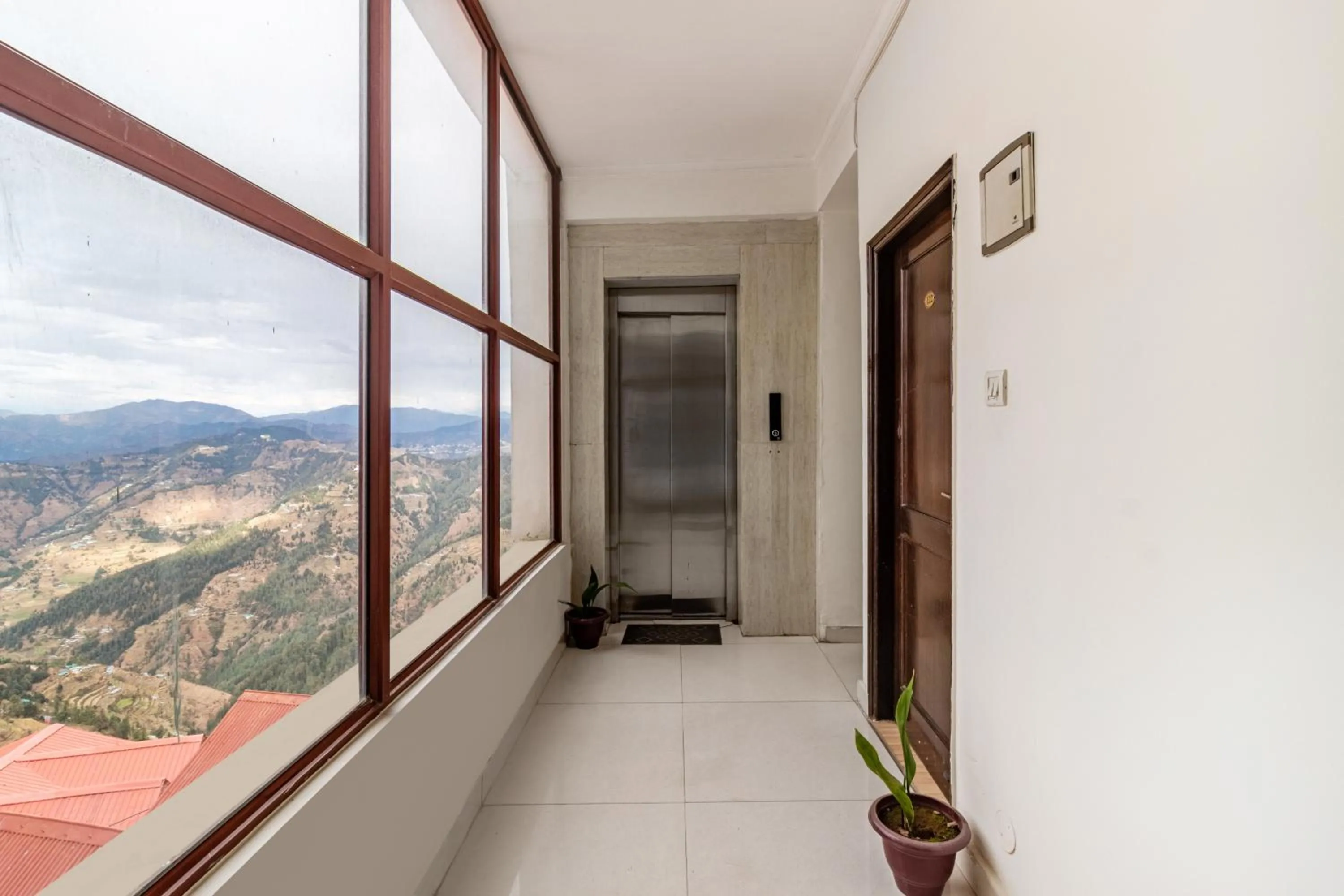 elevator, Mountain View in Treebo Trend Snow View Resort