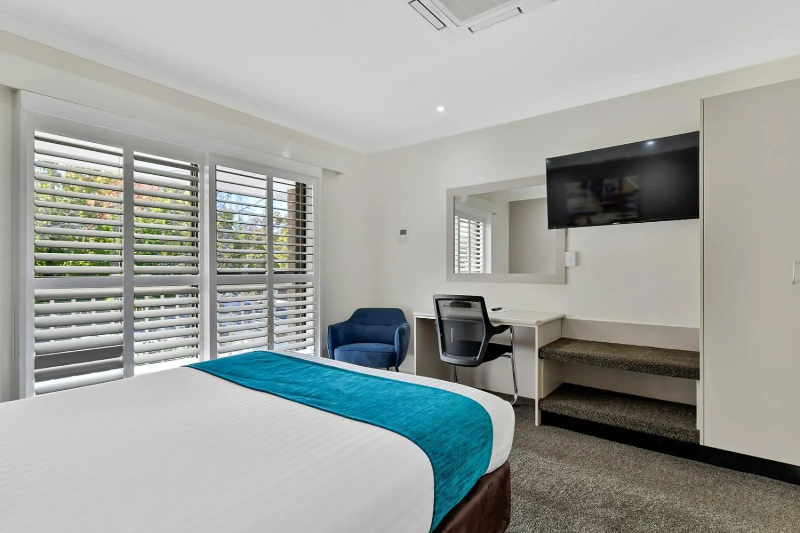 Bed in Central Caleula Motor Lodge