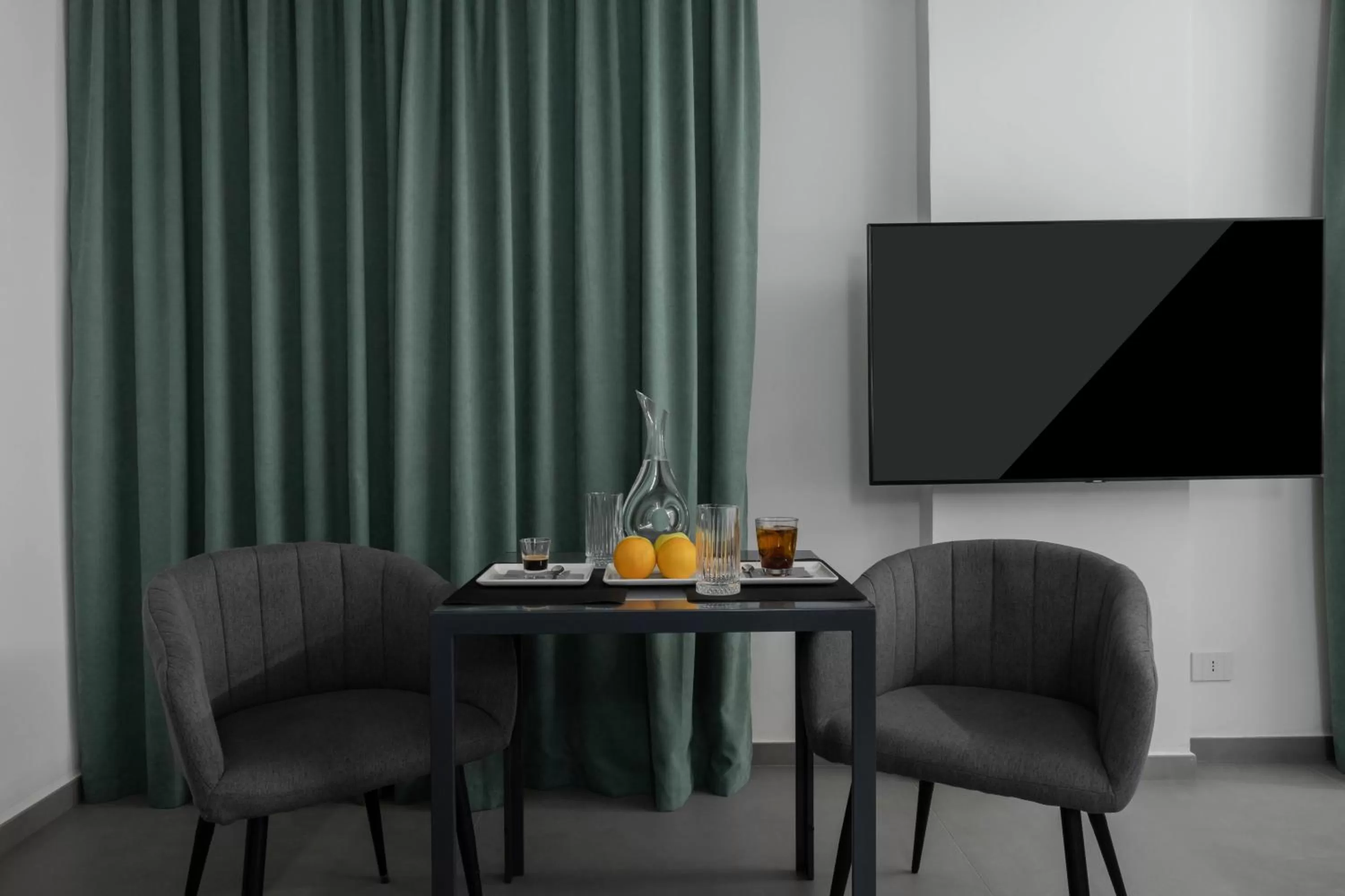 TV and multimedia in Suite Palermo Apartment