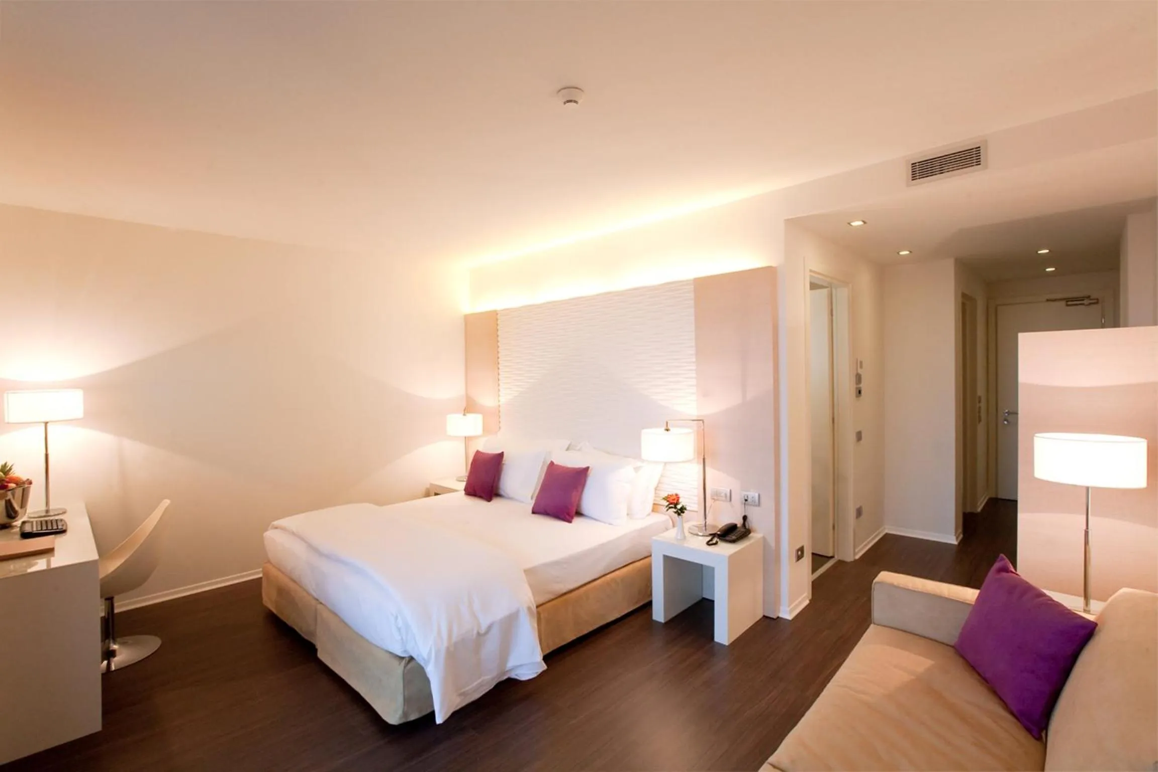 Bed in Laguna Palace Hotel Grado