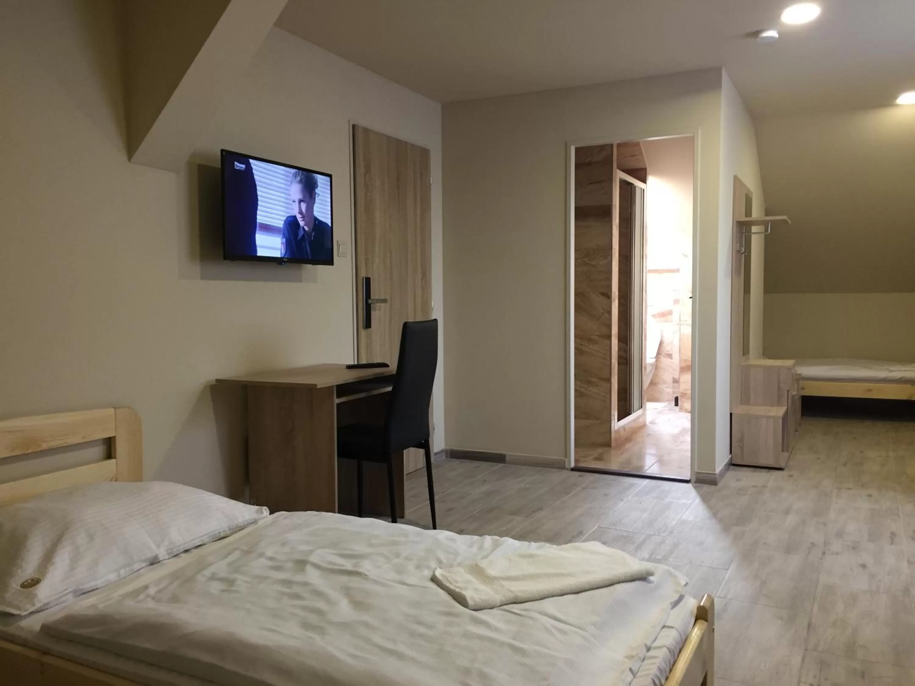 Photo of the whole room, TV/Entertainment Center in Hotel Taurus