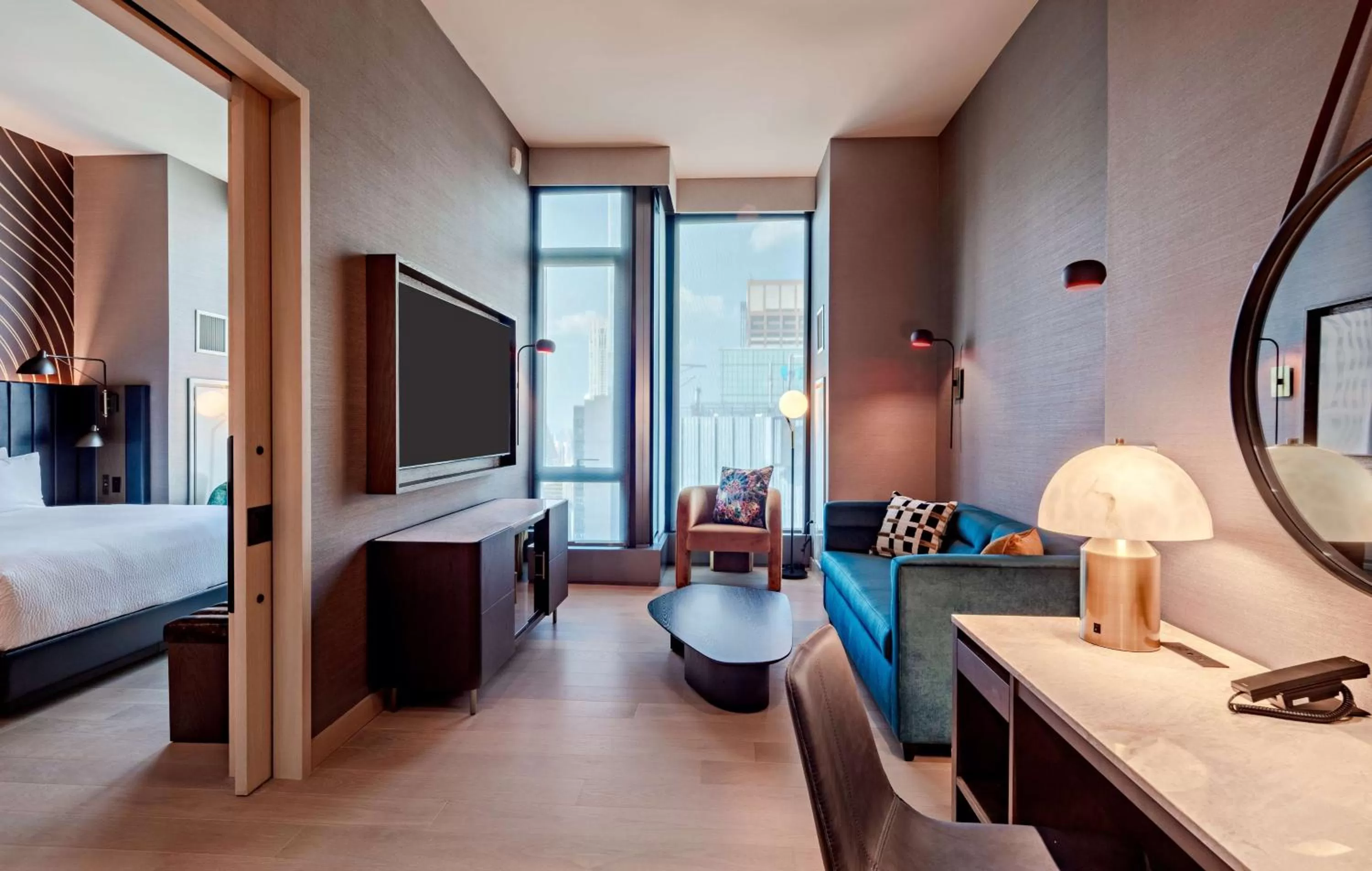 Living room, Bed in Tempo By Hilton New York Times Square