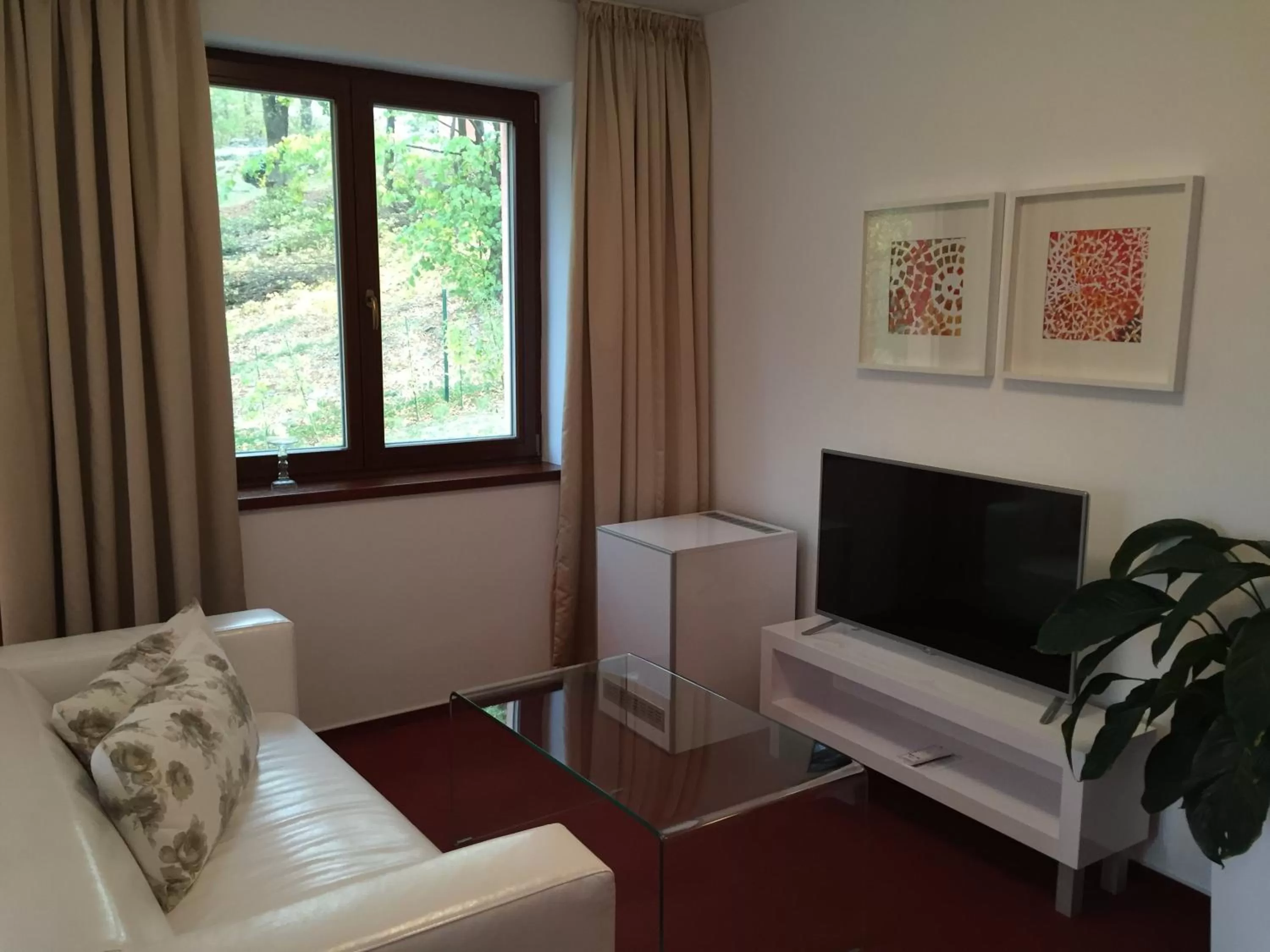 TV and multimedia, Seating Area in Hotel Cvilín