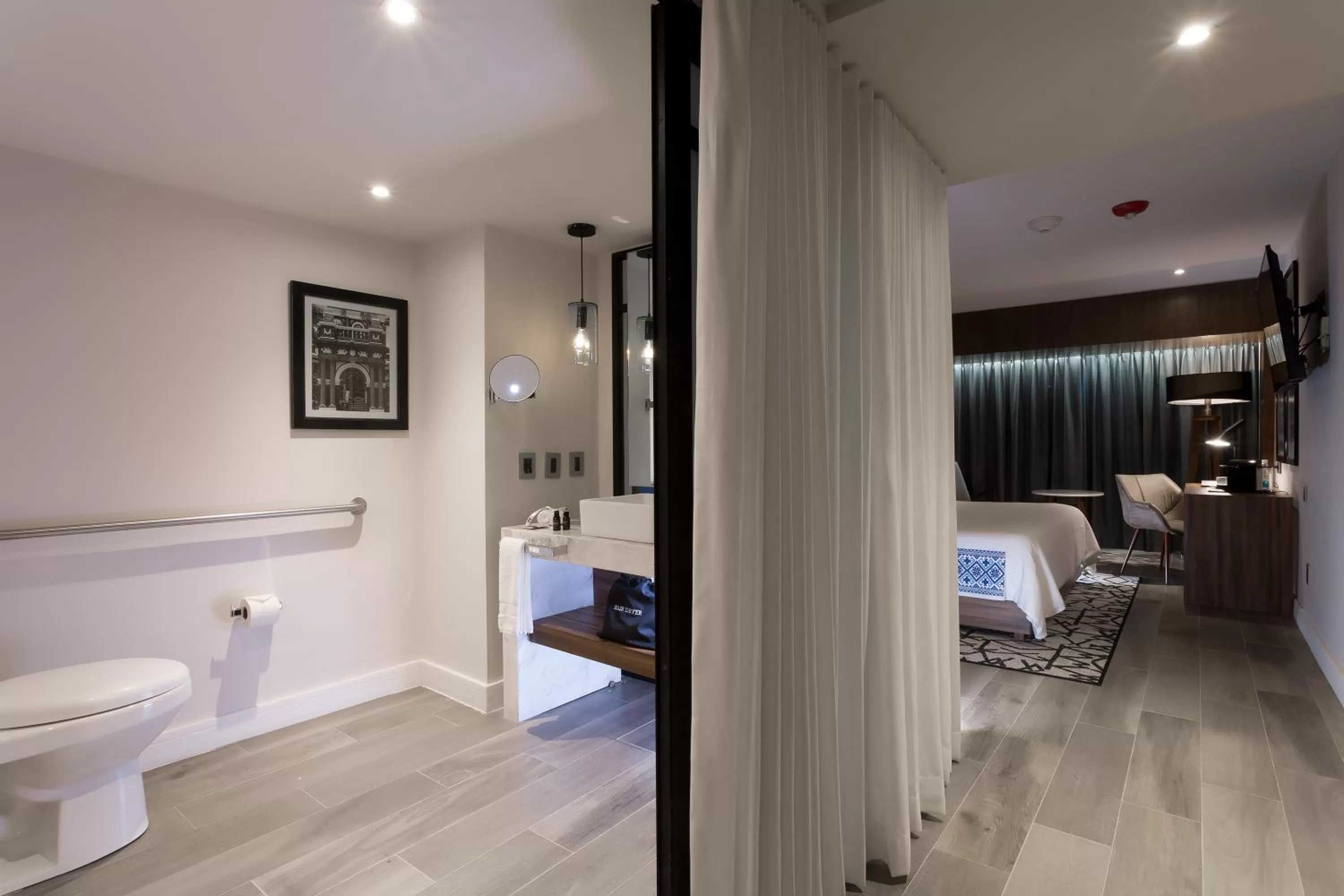 Bed in Hotel Indigo Guadalajara Expo by IHG