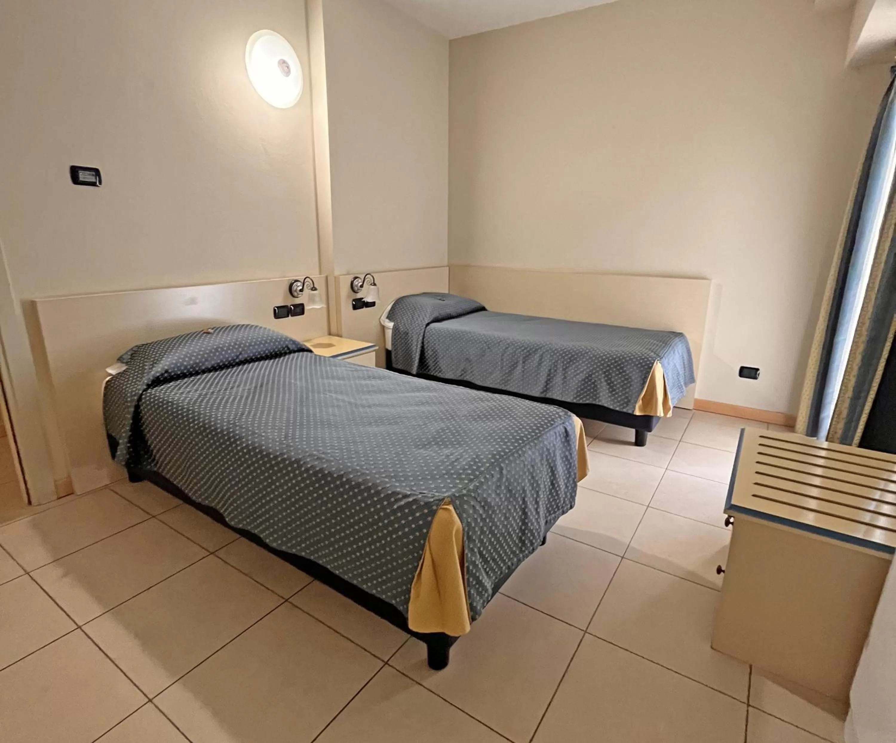 Bed in Hotel Lovere Resort & Spa