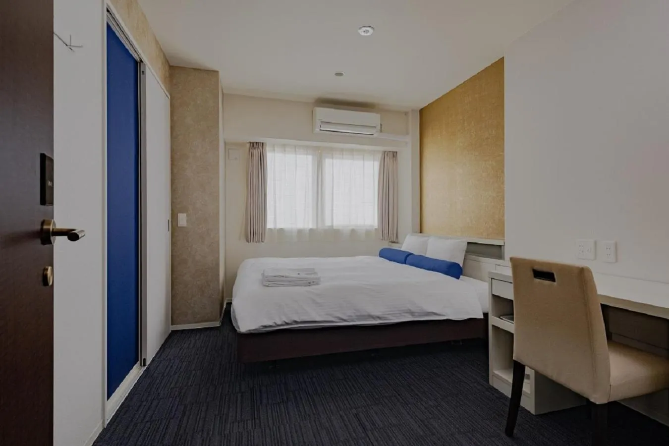 Bed in Folio Sakura Shinsaibashi Osaka by Banyan Group