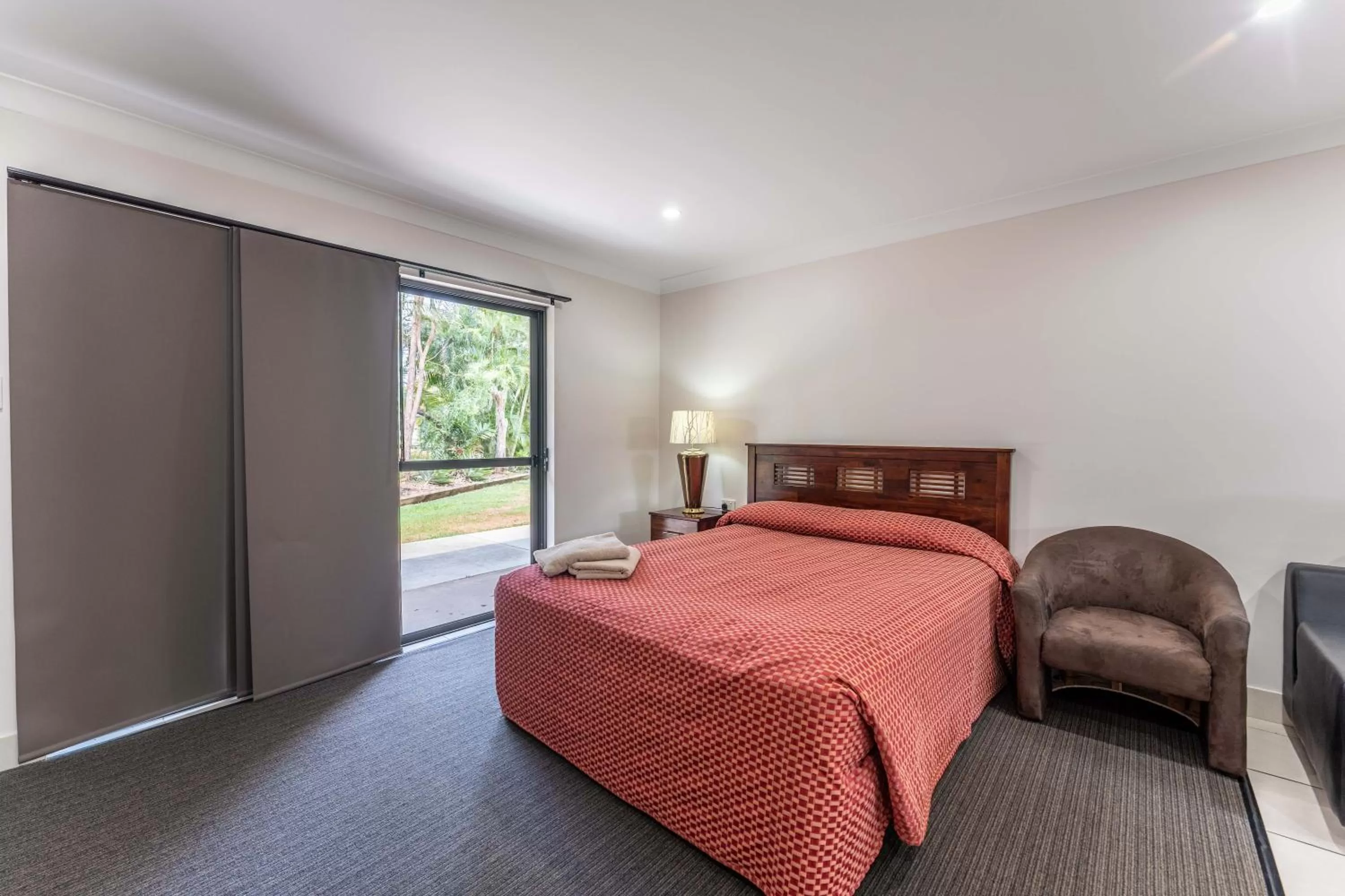 Bed in Emerald Gardens Motel & Apartments