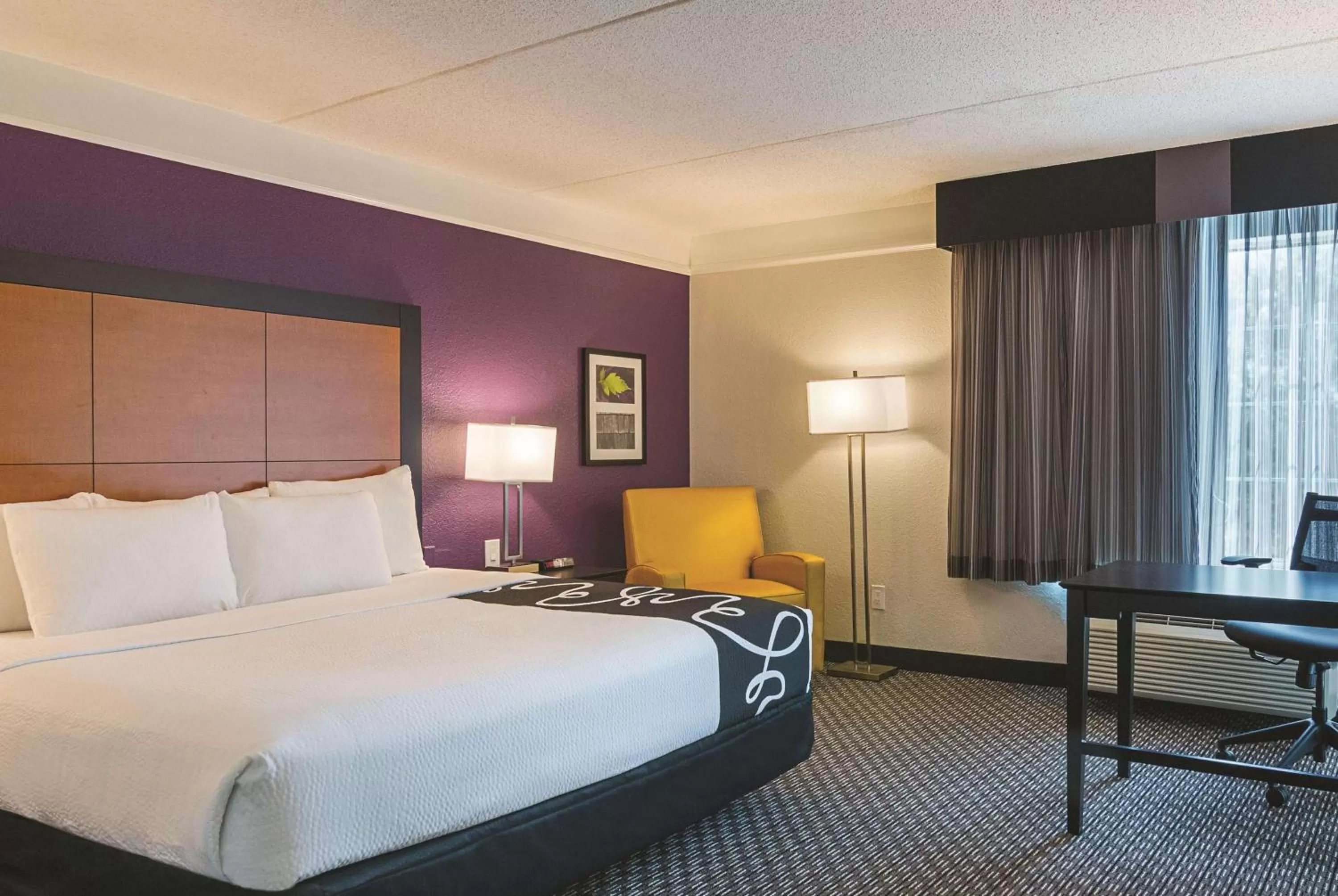 Photo of the whole room, Bed in La Quinta by Wyndham Orlando Airport North - Free Airport Shuttle!