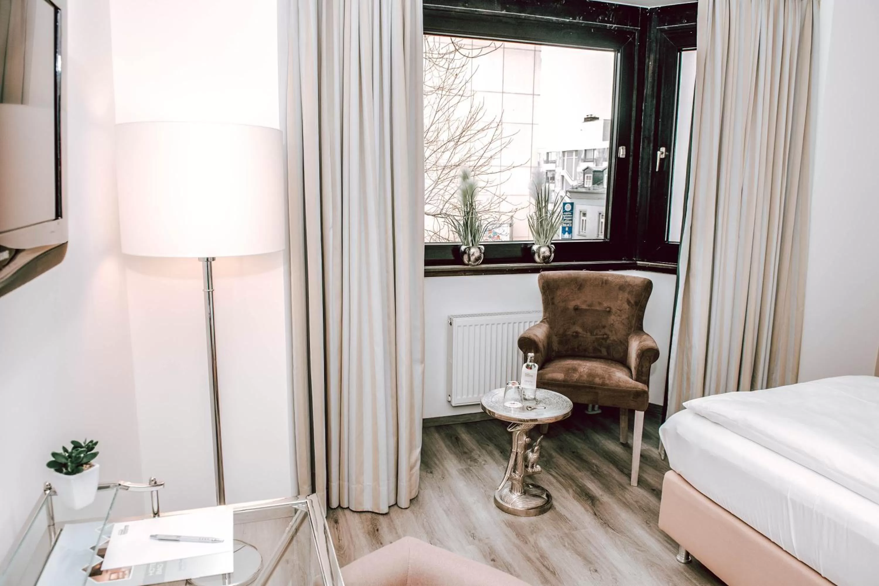 Seating area in Concorde Business Boutique Hotel