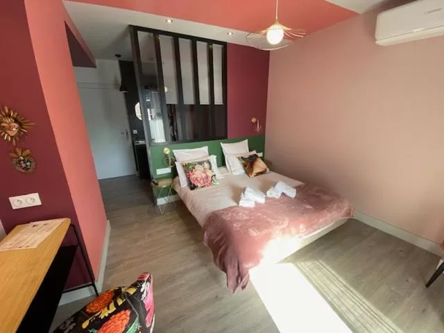 Bed in Chambre D'hôtes Chez Dom