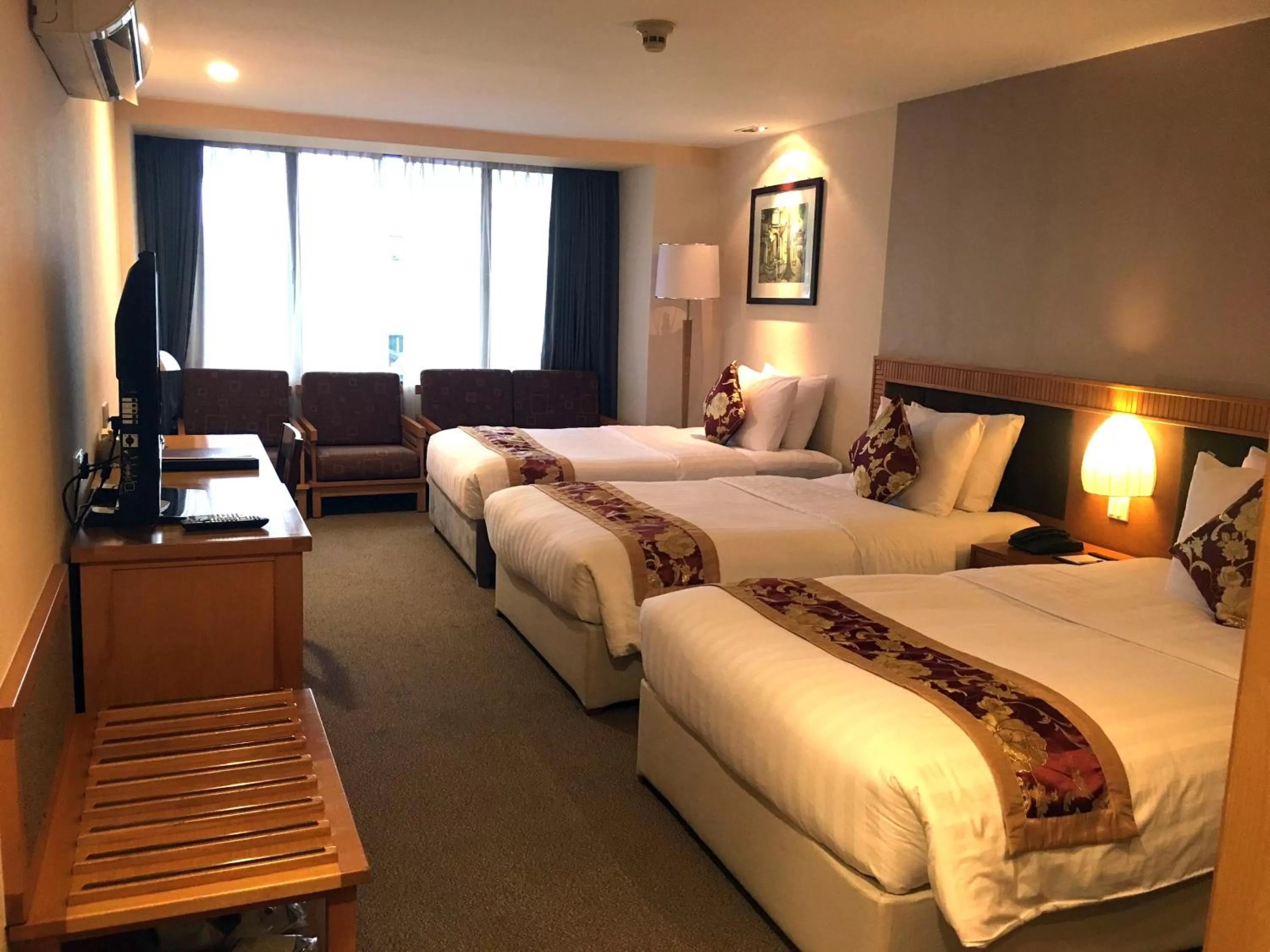 Photo of the whole room, Bed in Mon Regency Hotel