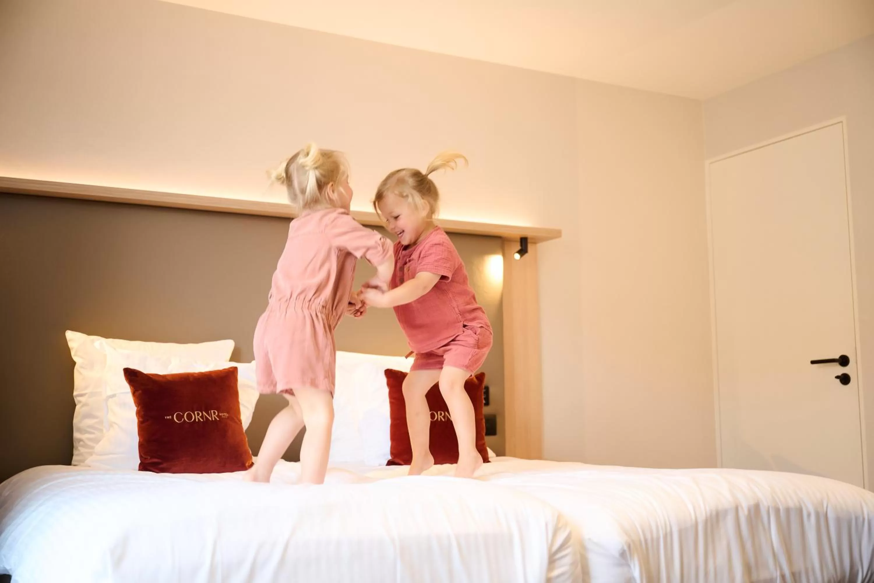 Bed in The CORNR Hotel