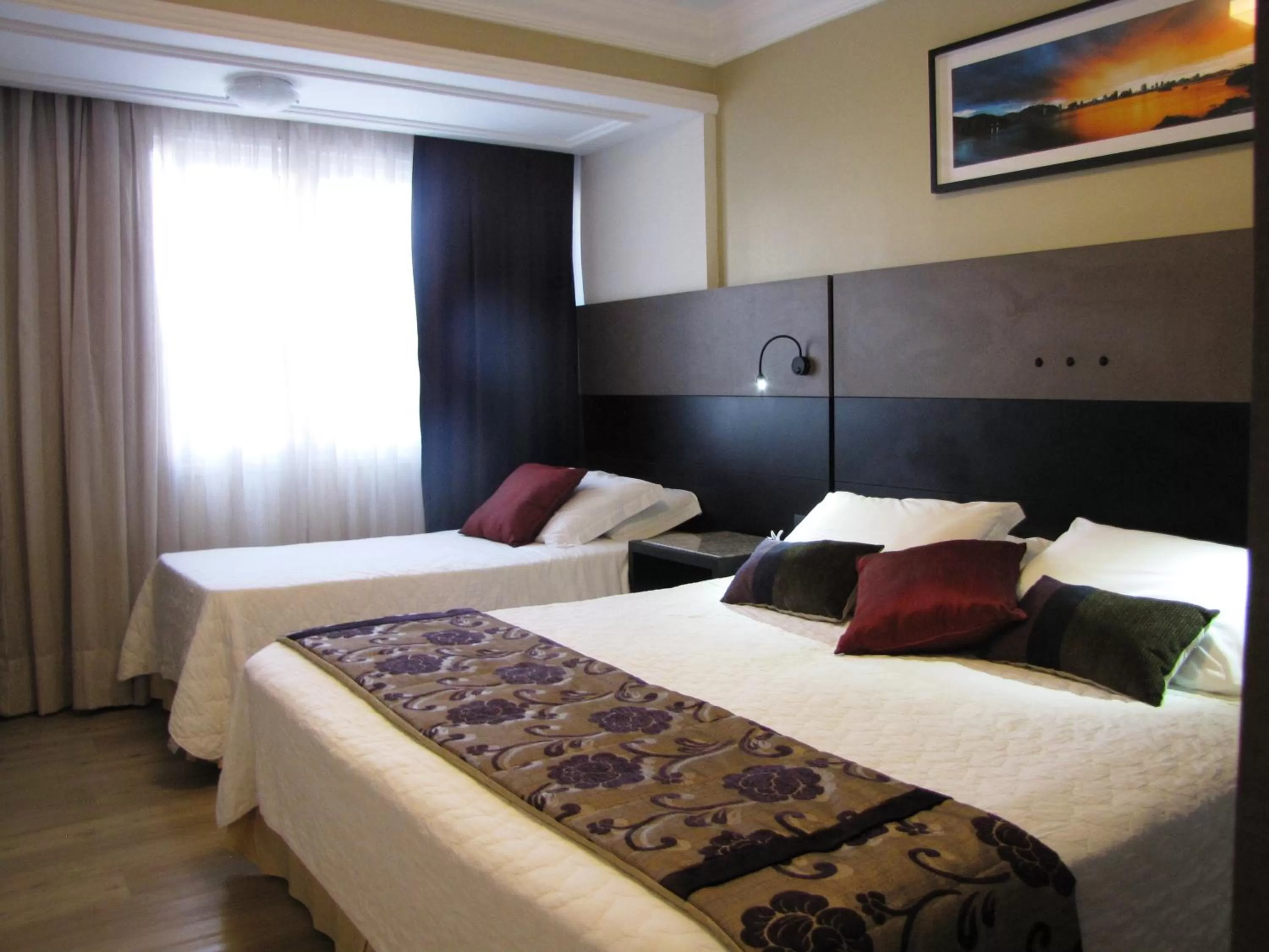 Bed in Sandri Palace Hotel