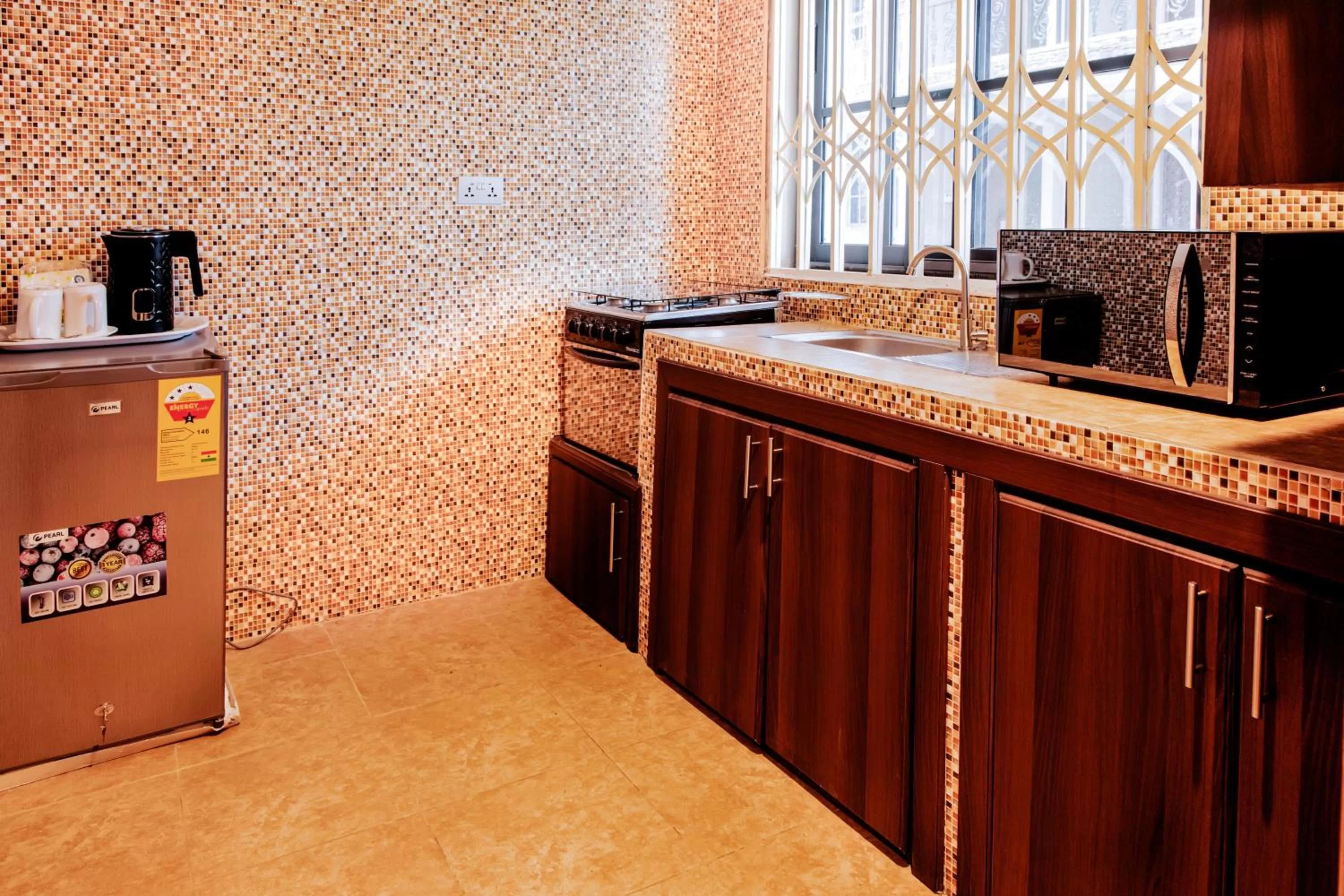 Kitchen/Kitchenette in AIDEN HOMES AND APARTMENTS