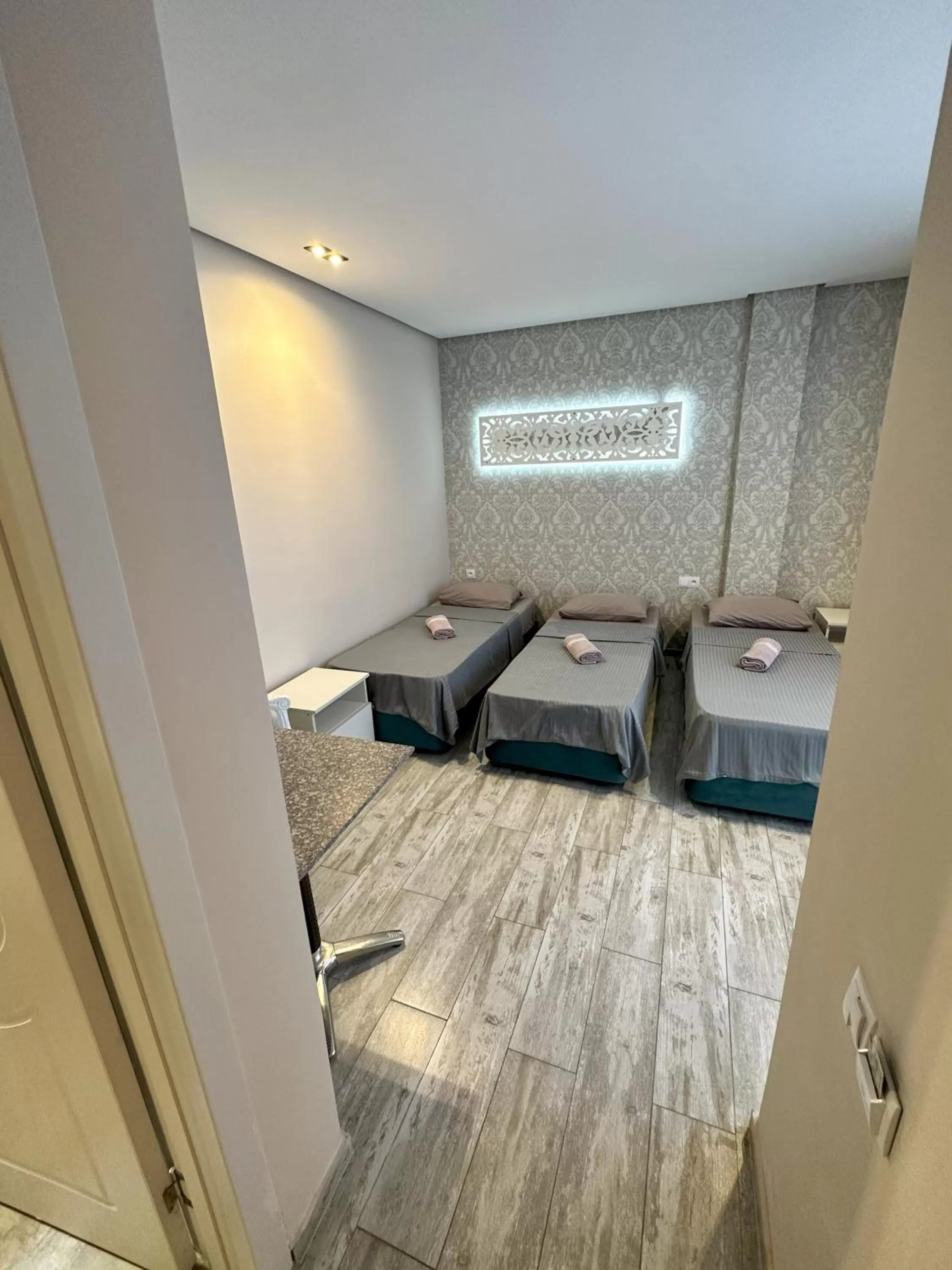 Photo of the whole room, Bed in National+