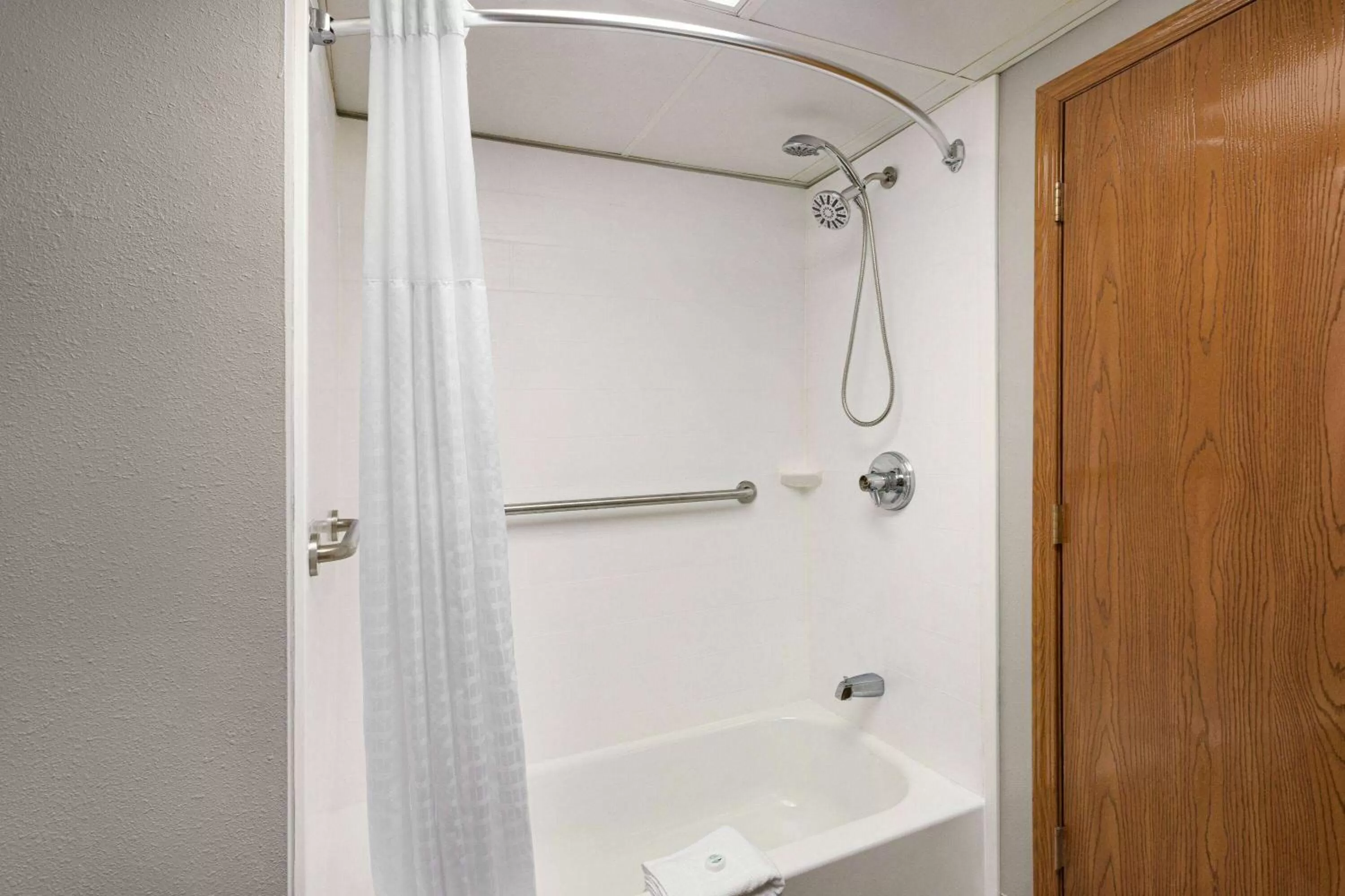 Shower in AmericInn by Wyndham Branson & Conference Center