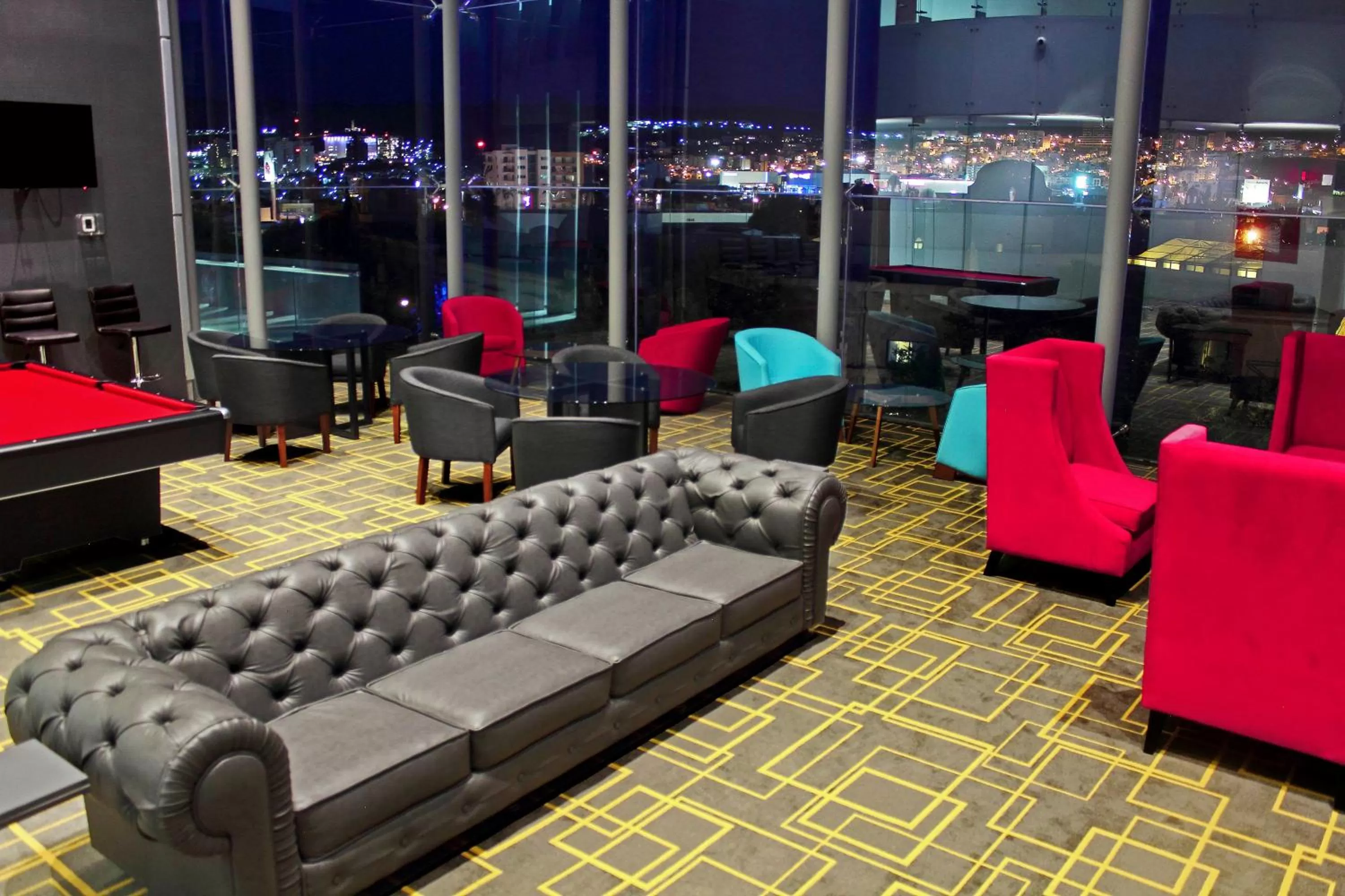 Communal lounge/ TV room in The View Hotel by Covalia