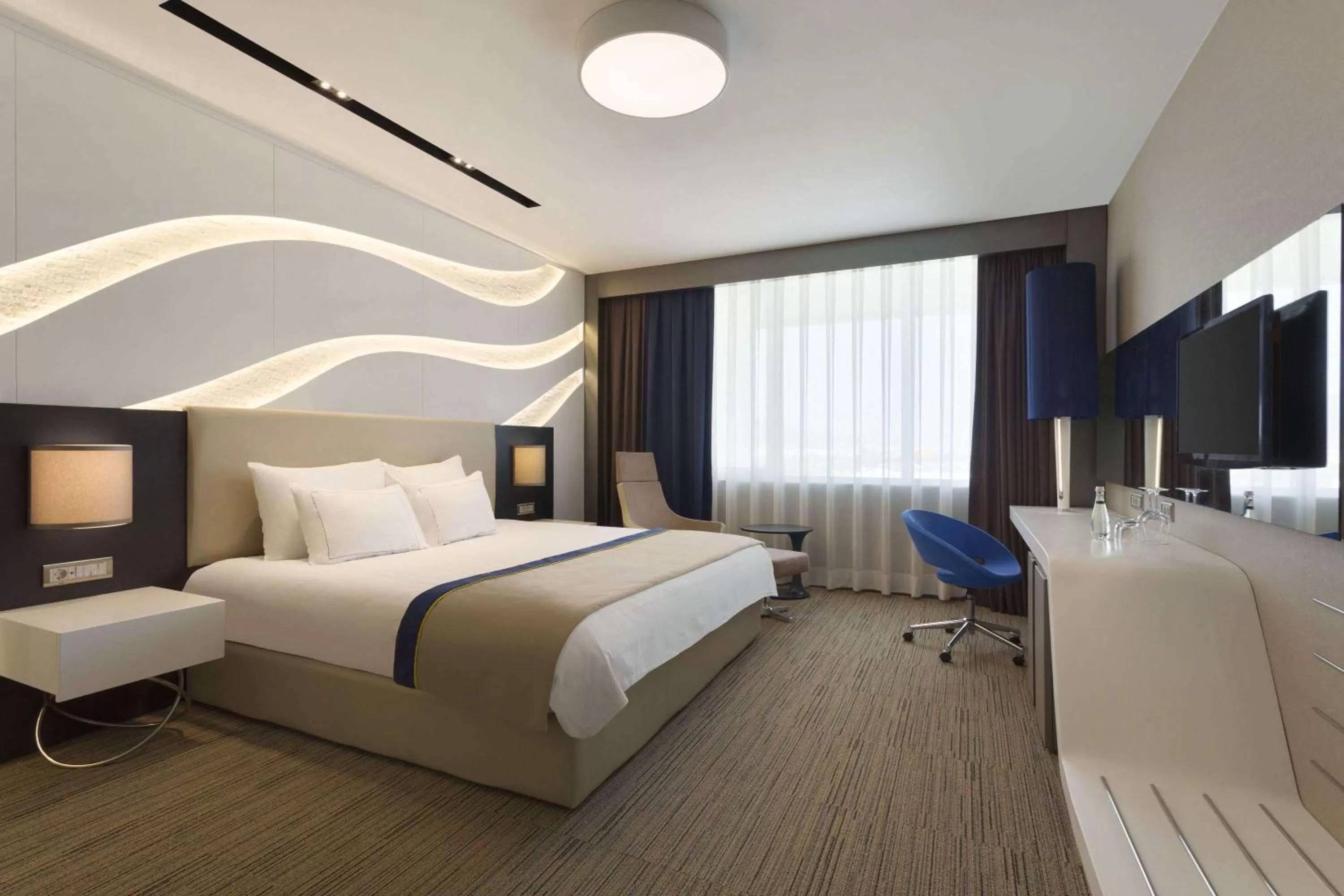 Photo of the whole room, Bed in Ramada Hotel & Suites by Wyndham Izmir Kemalpasa