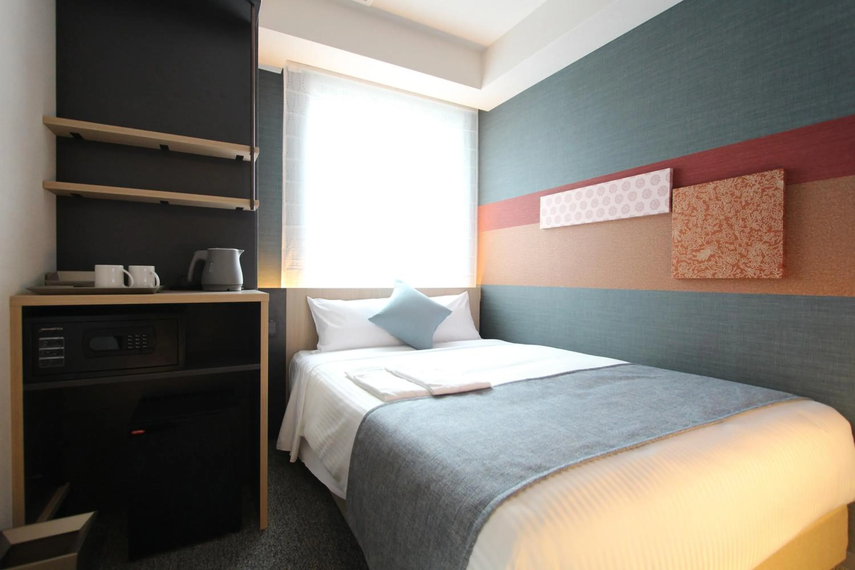 Bed in KOKO HOTEL Tsukiji Ginza