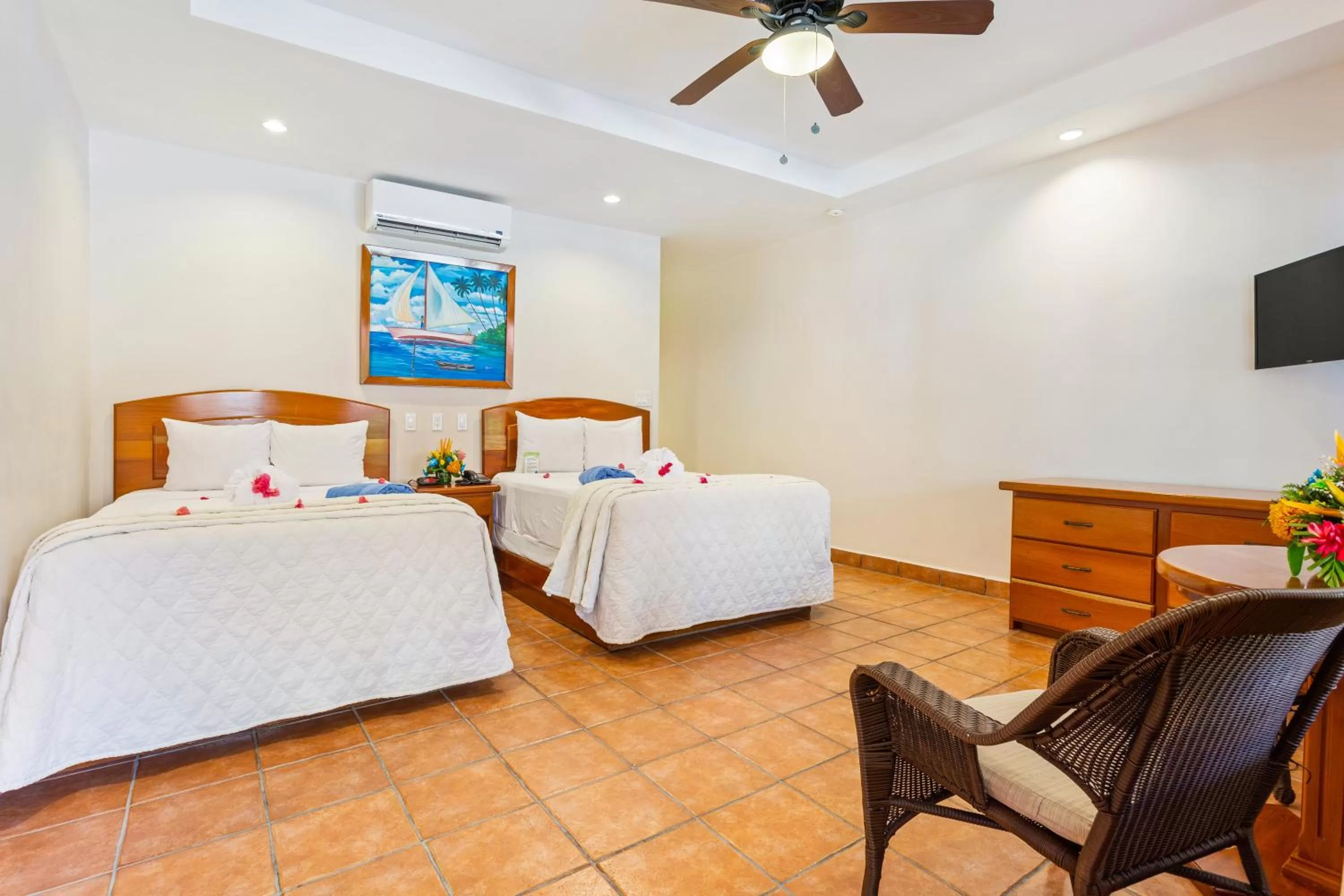 Bed in SunBreeze Hotel