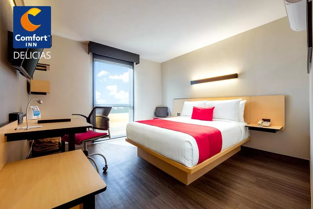 Bed in Comfort Inn Delicias