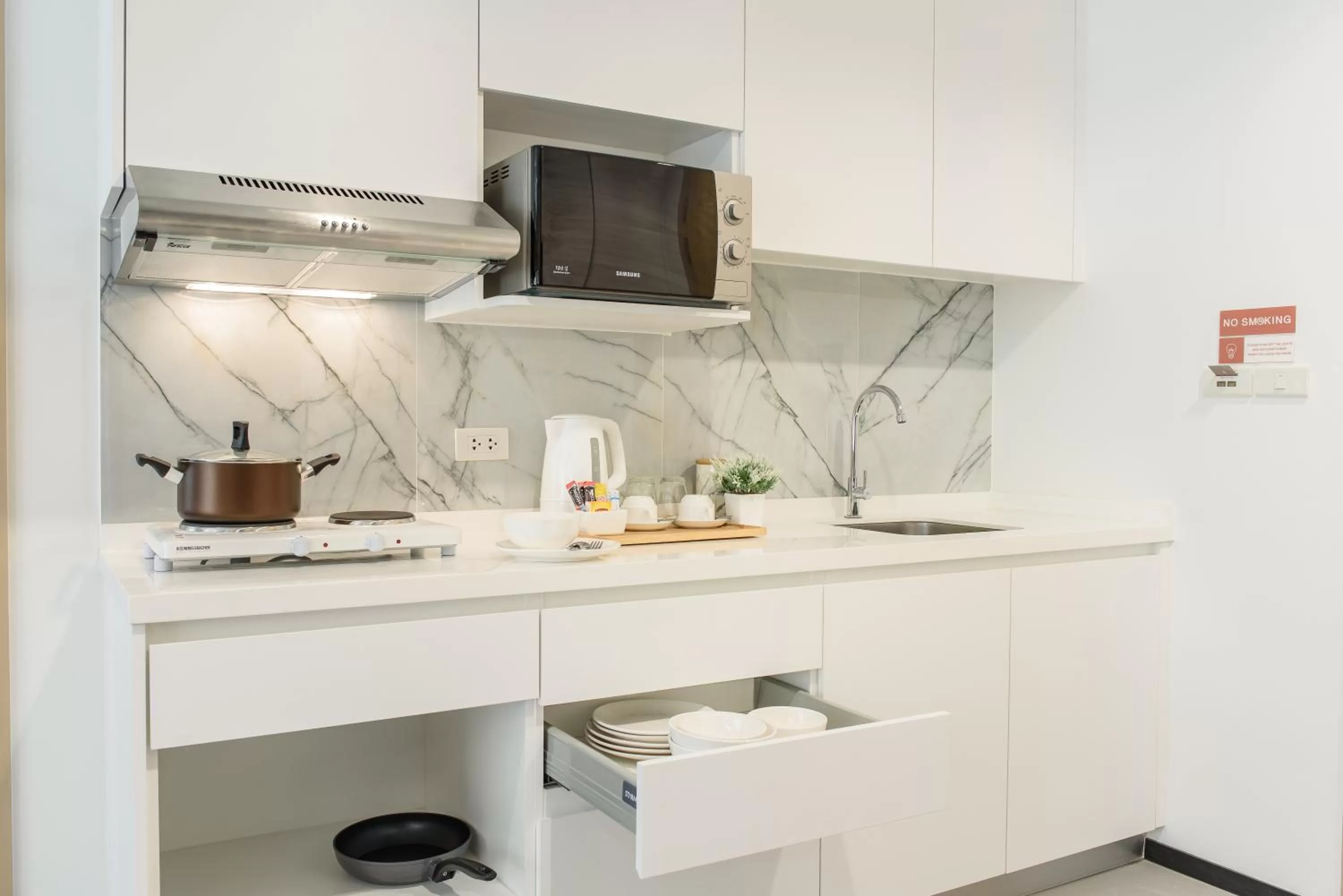 Kitchen or kitchenette in Alix Bangkok Hotel