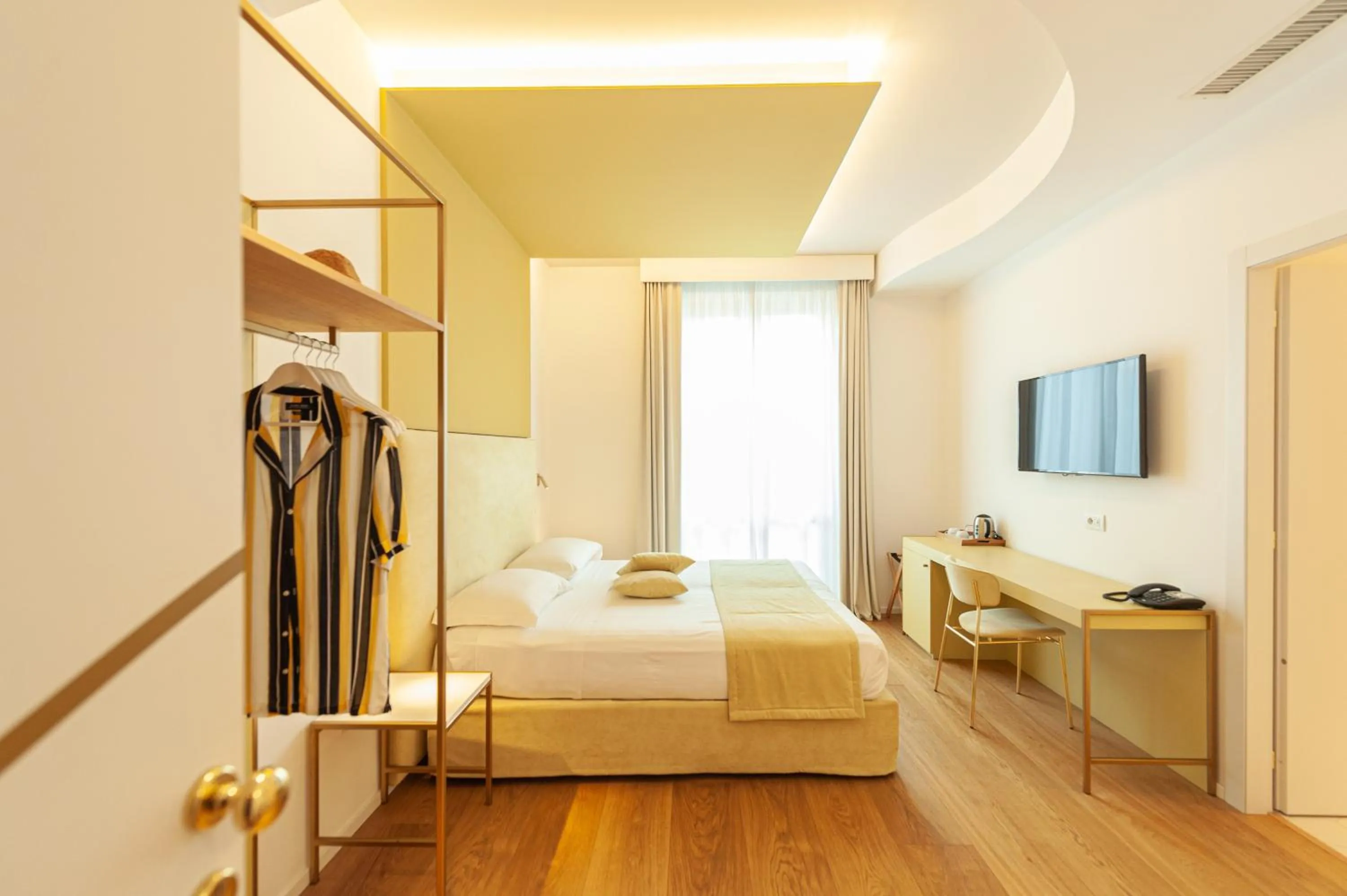 Bed in Hotel Aristeo