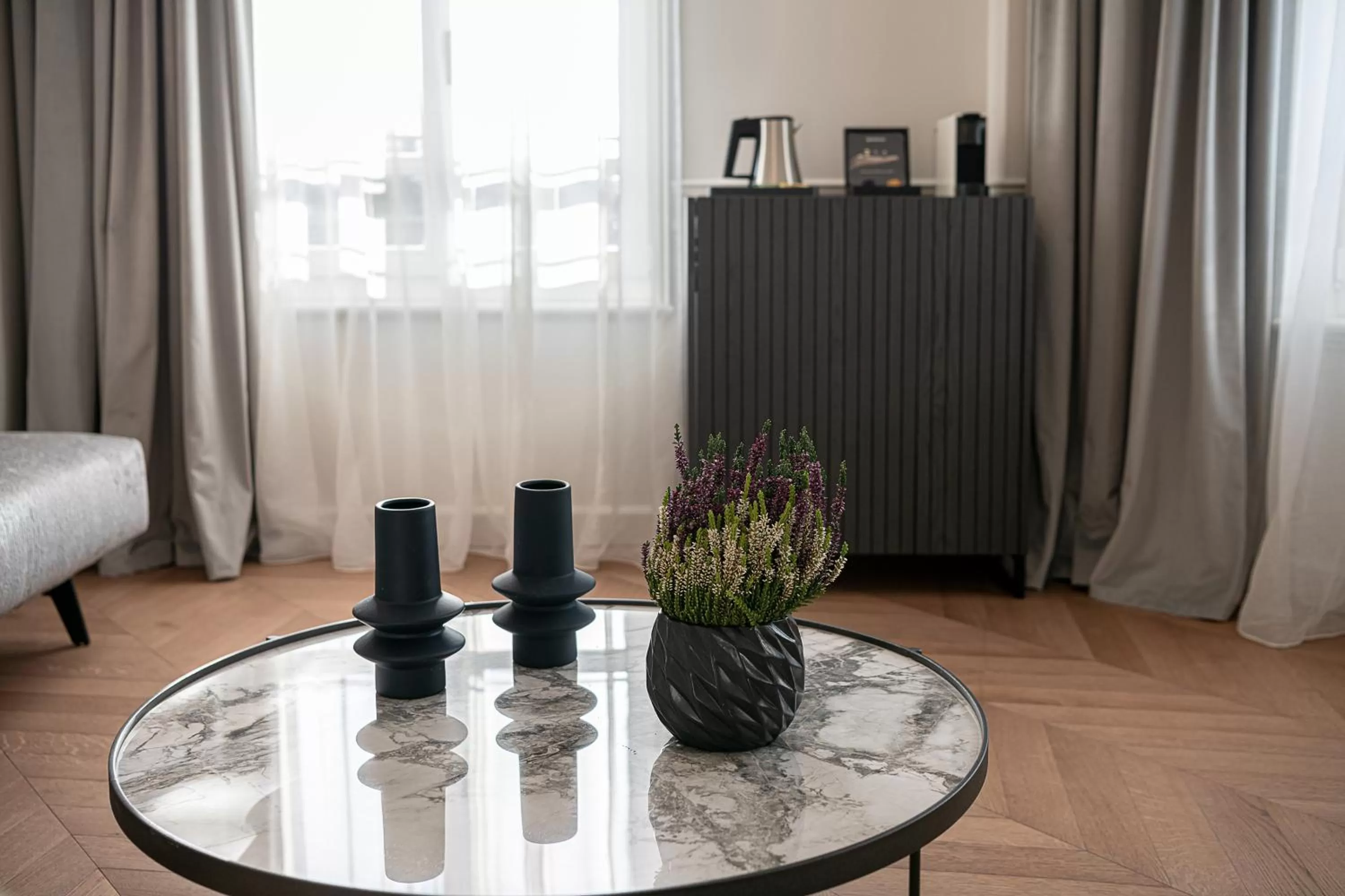 Seating area, Bed in Riviera Suites