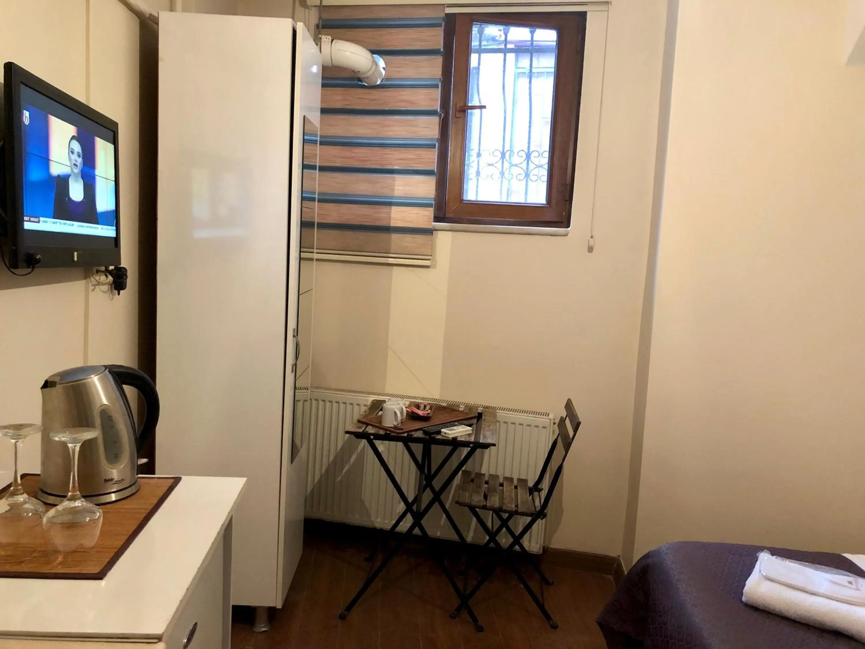 Photo of the whole room, TV/Entertainment Center in Centre Suites Taksim