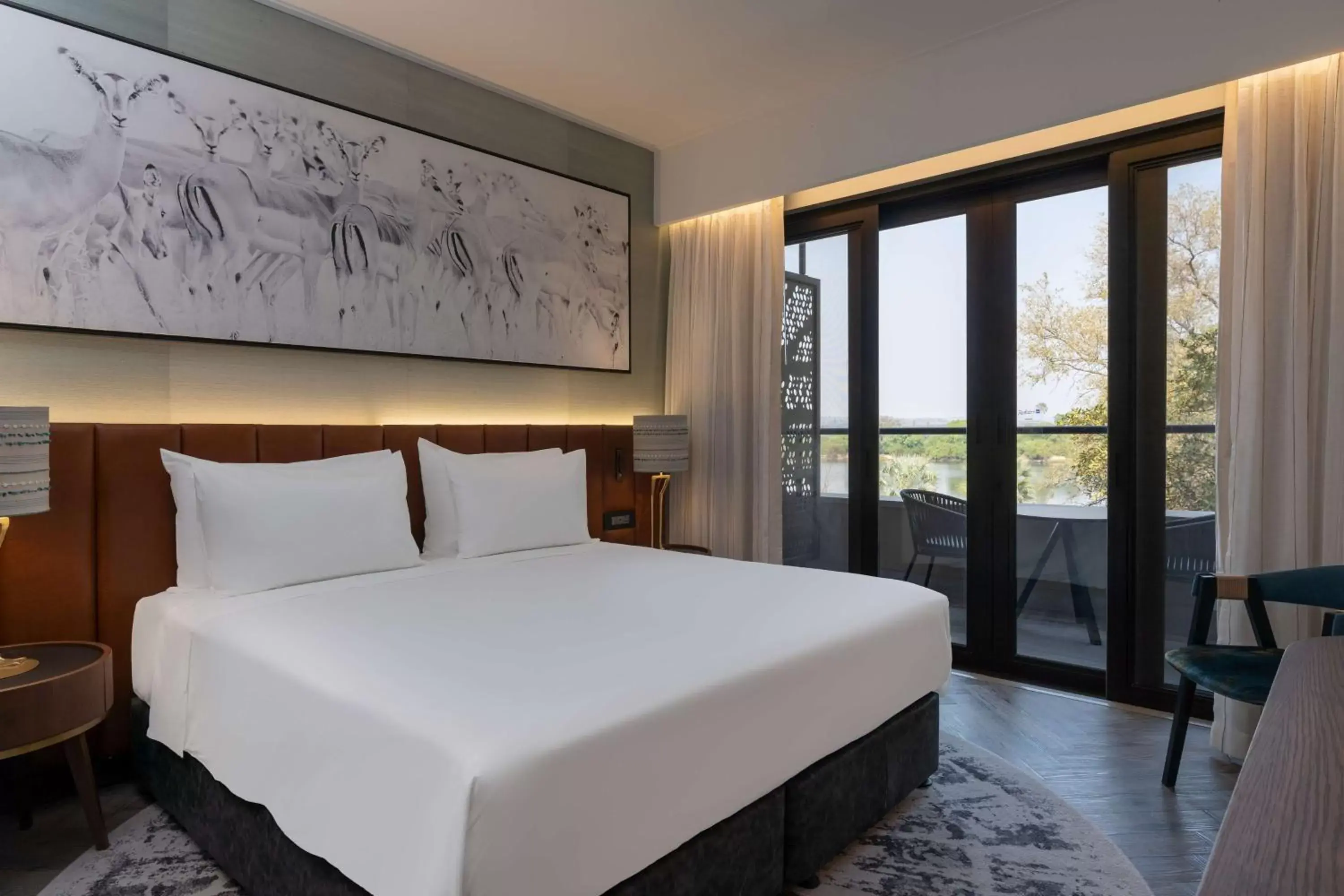 Premium Suite with Zambezi River View and Terrace in Radisson Blu Mosi-oa-Tunya Livingstone Resort Premium Suite with Zambezi River View and Terrace in Radisson Blu Mosi-oa-Tunya Livingstone Resort