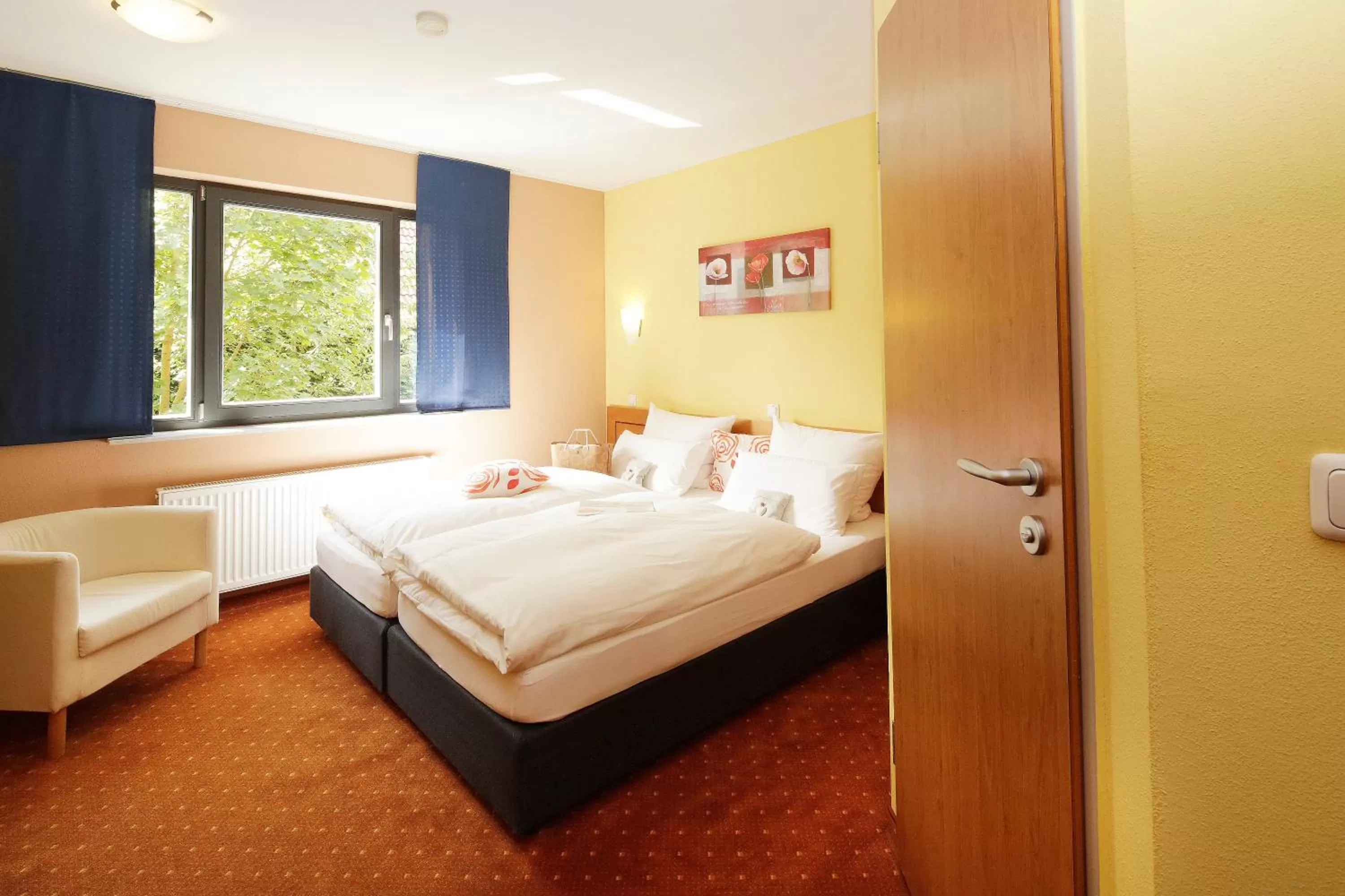 Photo of the whole room, Bed in BIO Hotel Bayerischer Wirt Augsburg