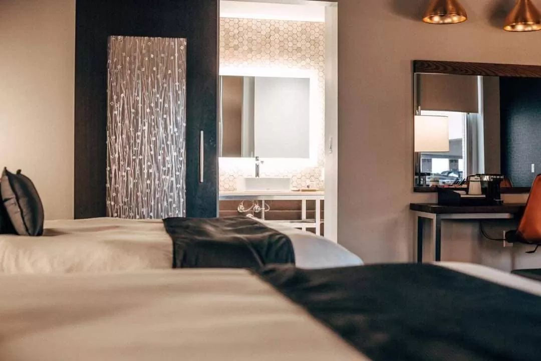 Bed in CityFlatsHotel - Grand Rapids, an Ascend Collection Hotel