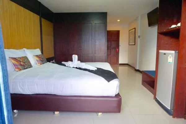 Photo of the whole room, Bed in Suppamitr Villa Hotel